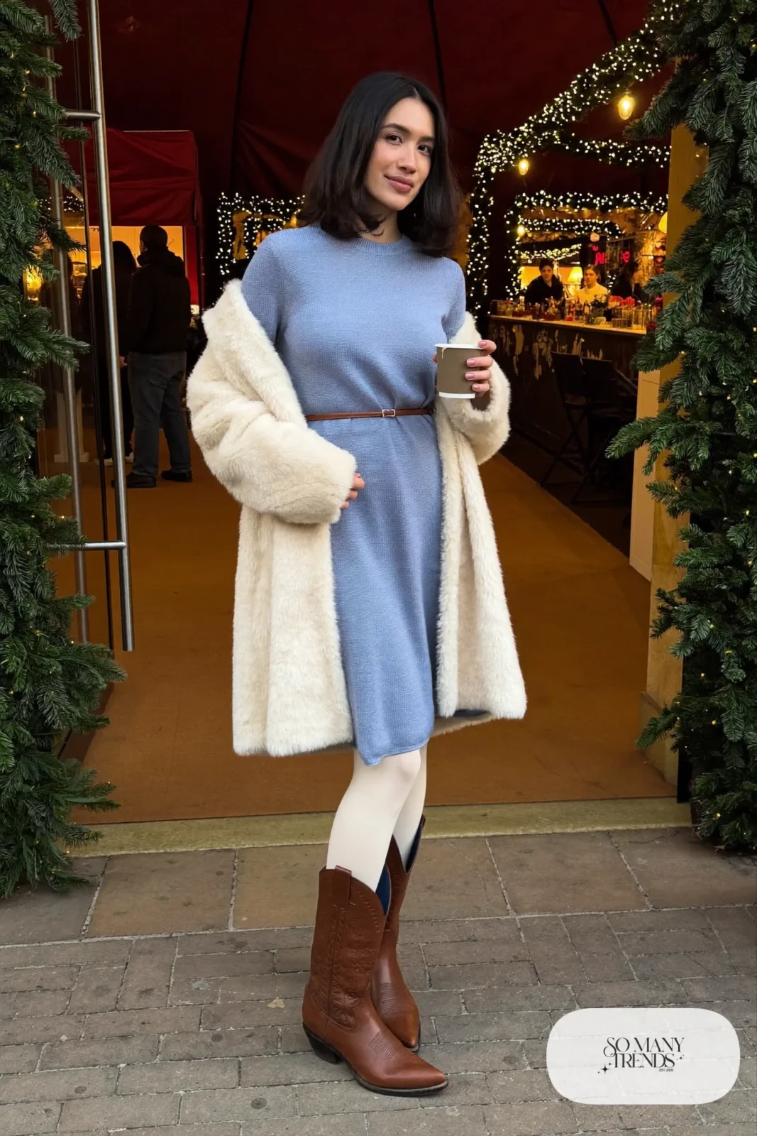 Powder blue knit midi dress, cream faux fur coat, opaque cream tights and tan cowboy boots, outfit 27