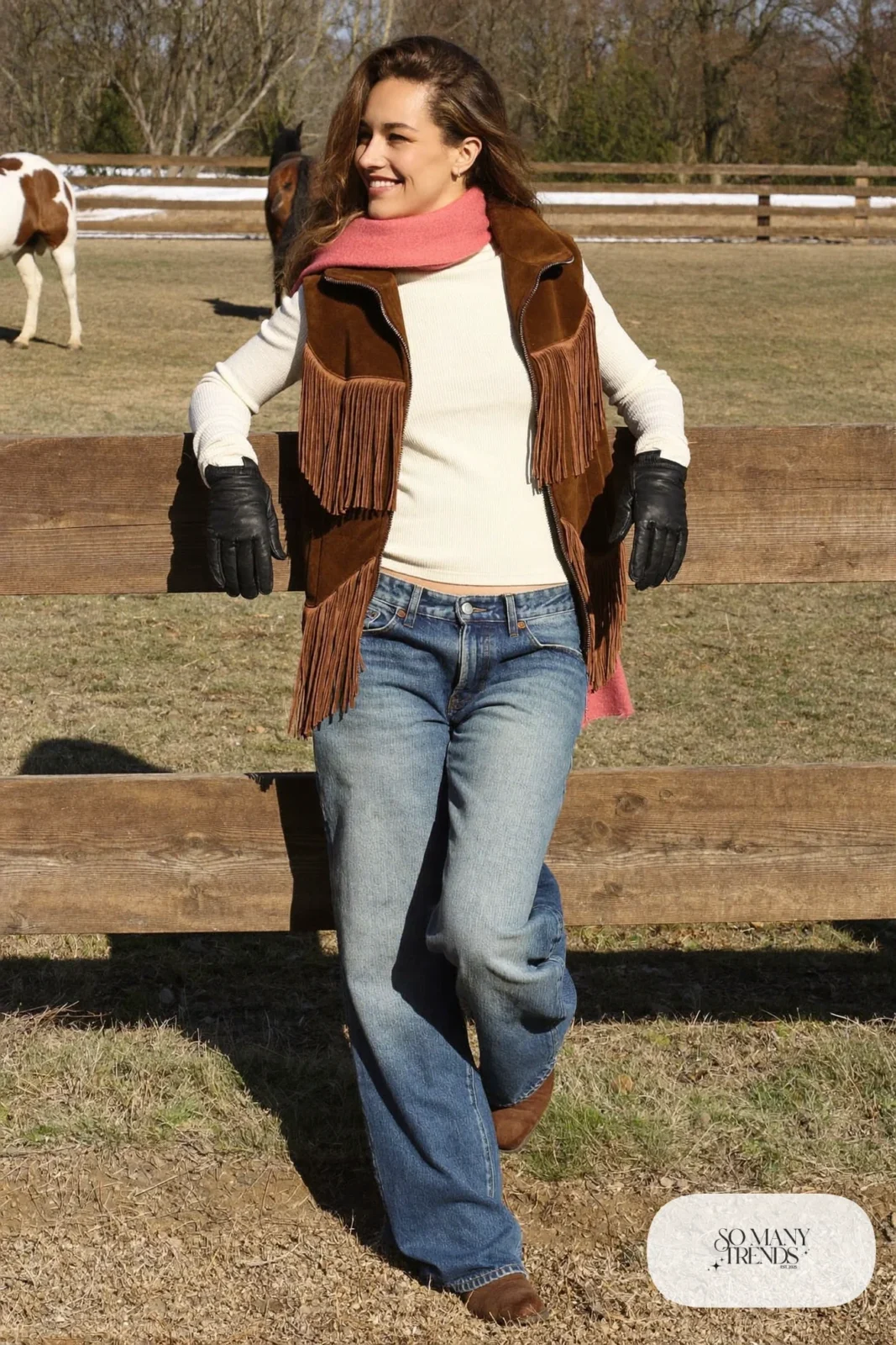 Chocolate fringe suede vest over cream thermal long-sleeve top with bootcut jeans and rose scarf, outfit 4