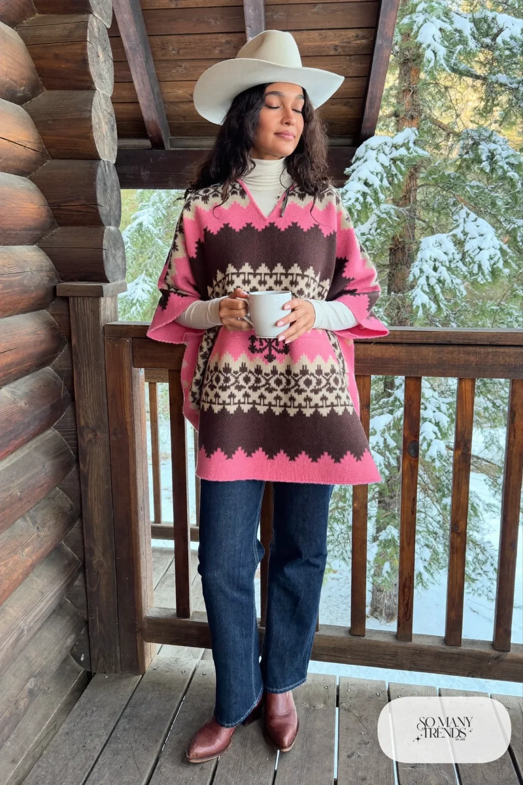 Rose cream and brown geometric wool poncho over turtleneck with straight dark jeans and brown boots, outfit 7