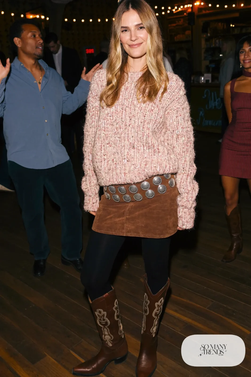 Oversized cream sweater with chocolate suede mini skirt, black tights and tall brown cowboy boots, outfit 16