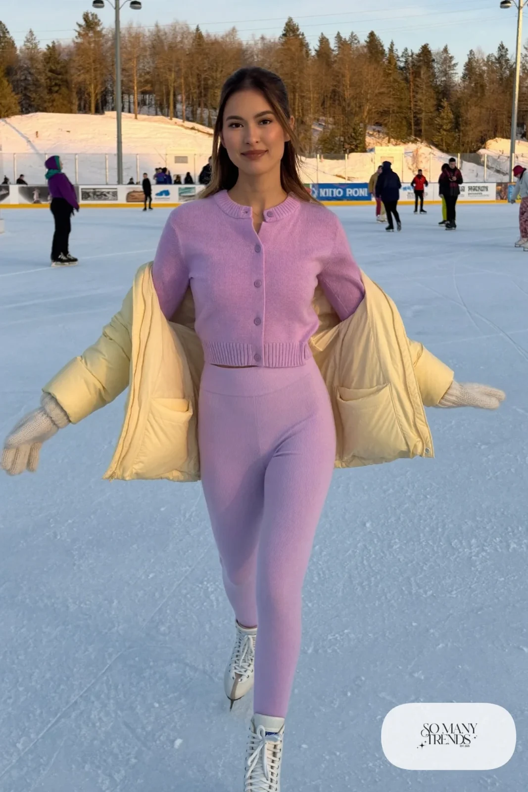 Lilac knit cardigan and matching pants set under cream hip-length puffer jacket, cream mittens and ice skates - outfit 21
