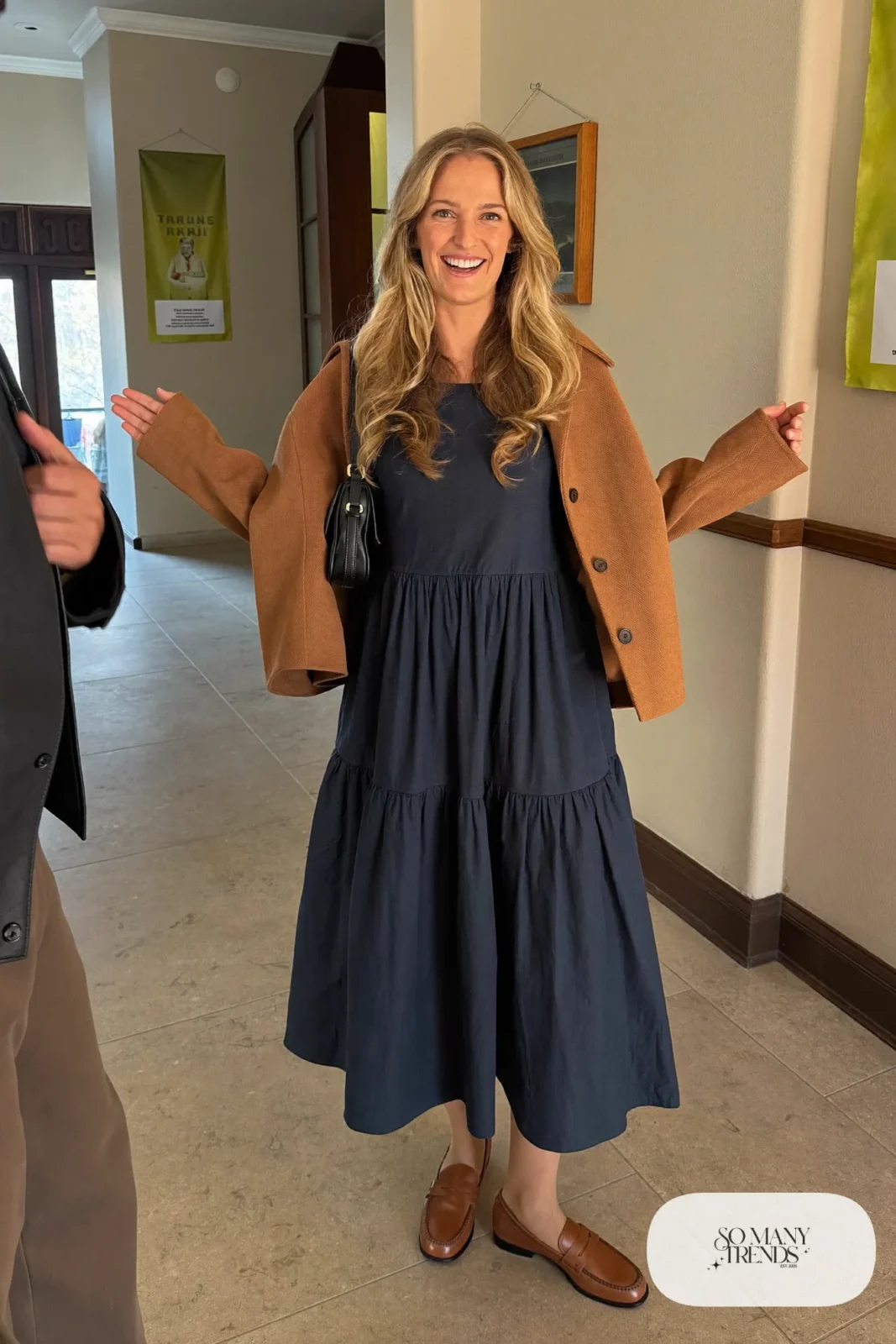 Navy tiered midi dress, camel cropped jacket, sheer tights and tan loafers - outfit 7