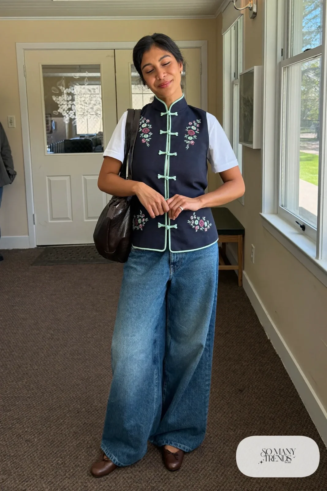 Navy embroidered vest, white tee, wide baggy mid-blue jeans and brown flats - outfit 12