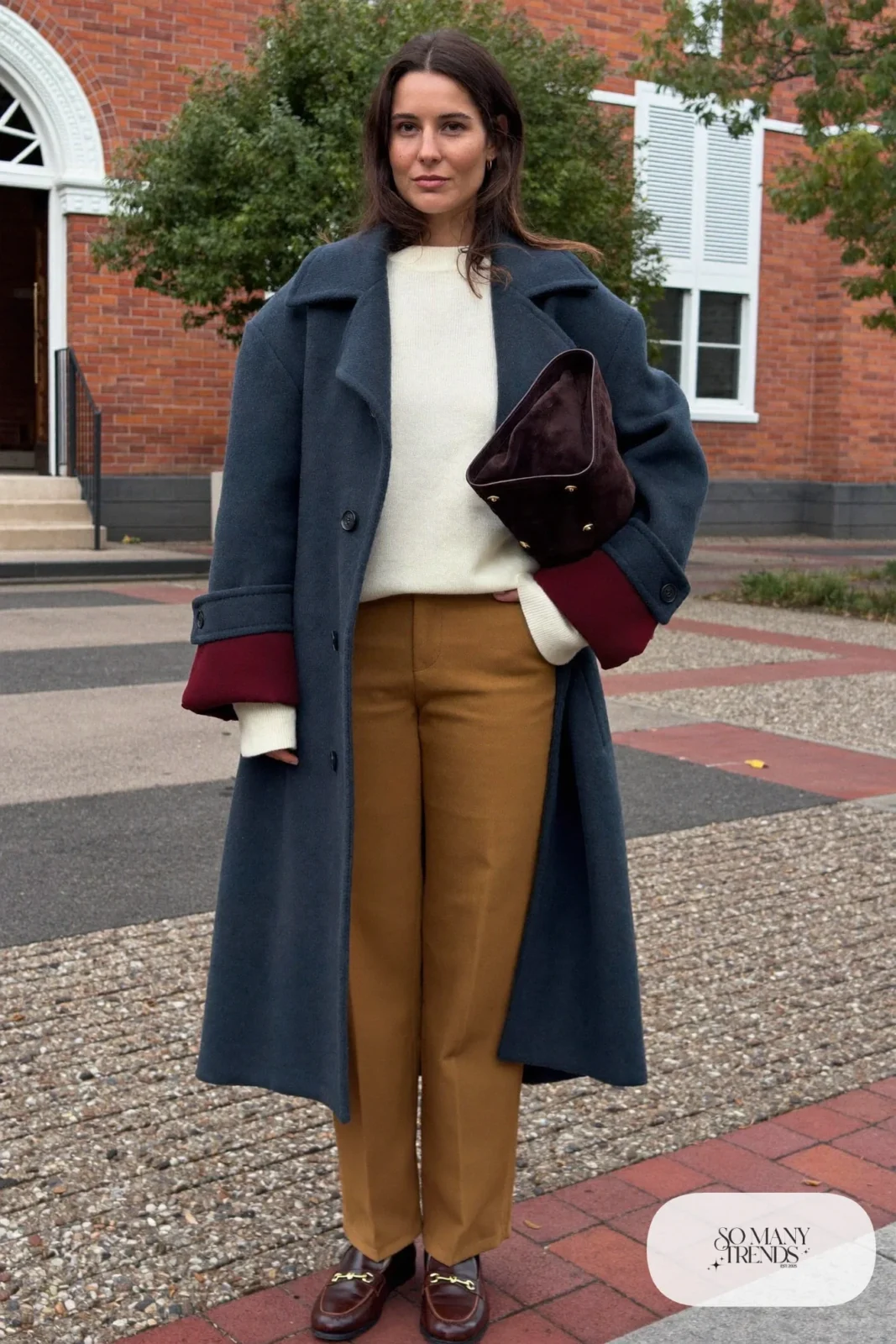 Oversized navy wool coat, cream sweater, khaki pants, brown loafers and suede bag - outfit 23