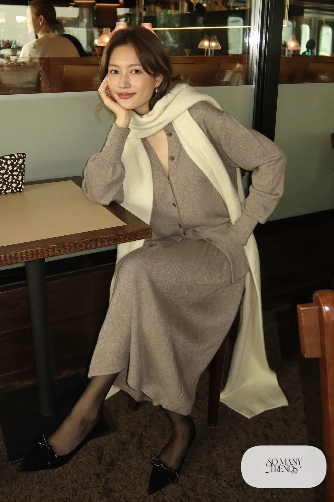 Taupe knit cardigan and matching knit midi skirt with black pointed flats and long scarf, winter date outfit 5