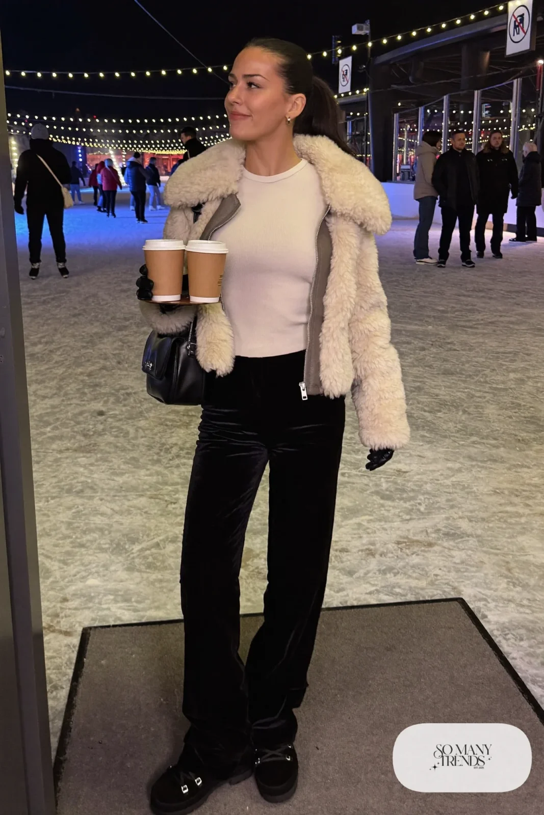 Cropped faux shearling jacket, cream knit top, black velvet straight pants and black traction boots, winter date outfit 22