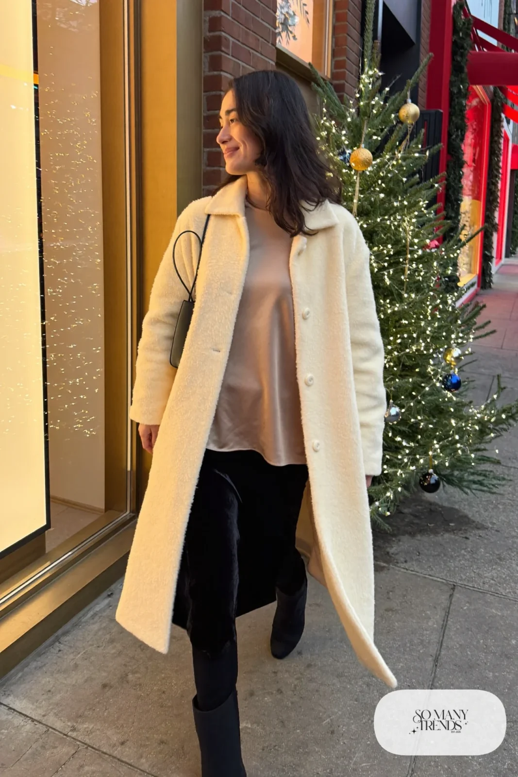 Cream teddy coat, black velvet midi skirt, champagne knit top, fleece tights and black boots, winter date outfit 27
