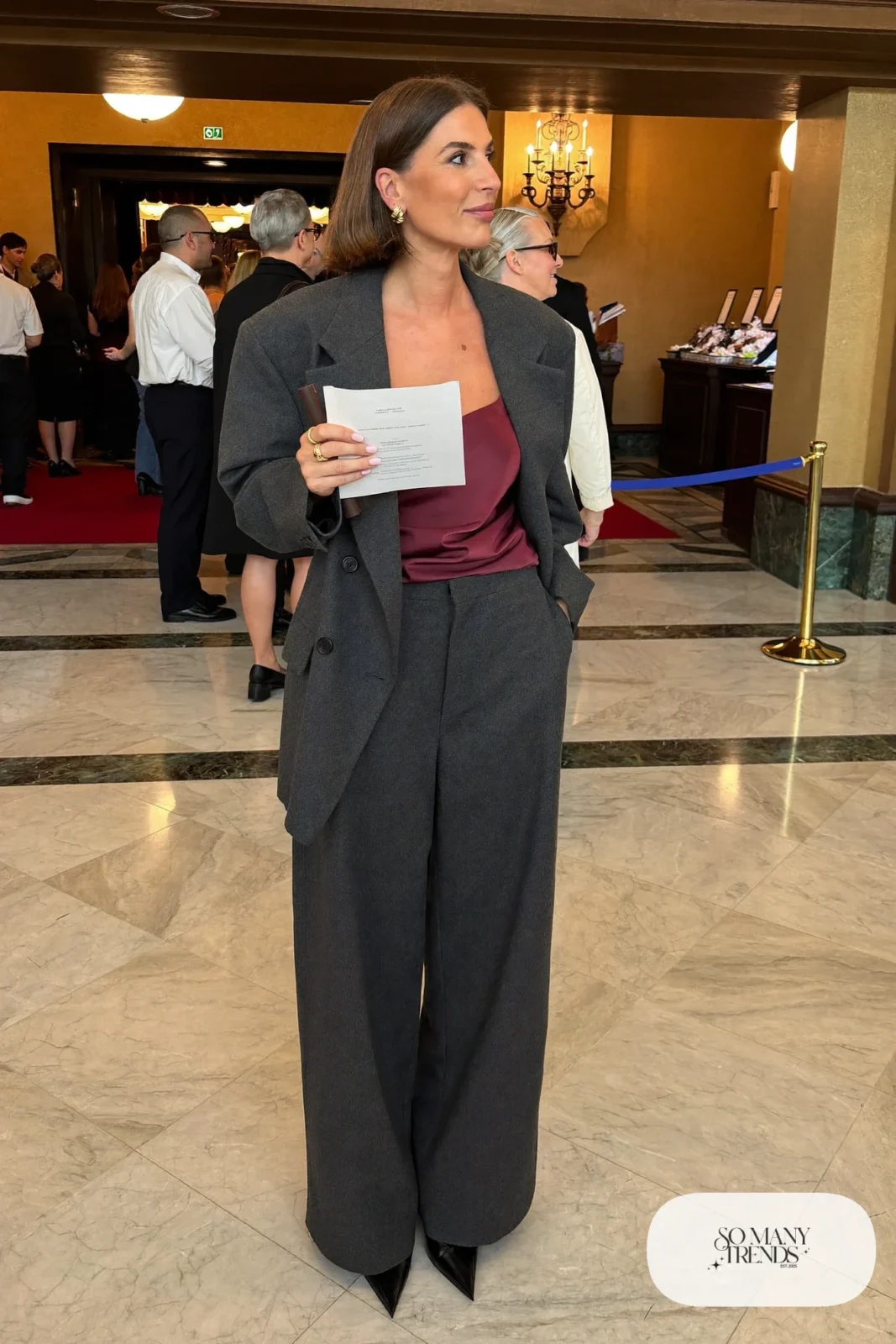 charcoal wool relaxed blazer, matching wide-leg pants, burgundy silk camisole, black pointed pumps, nutcracker outfit 13