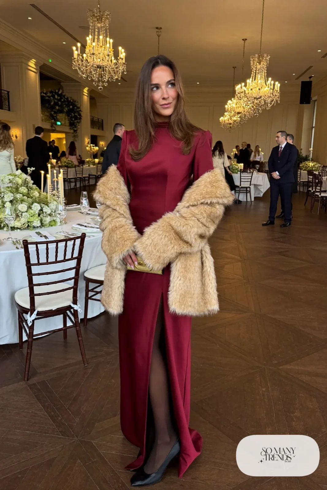 wine red satin column long-sleeve maxi dress, champagne faux fur wrap, black closed-toe pumps, sheer tights, evening clutch, winter wedding guest outfit 14