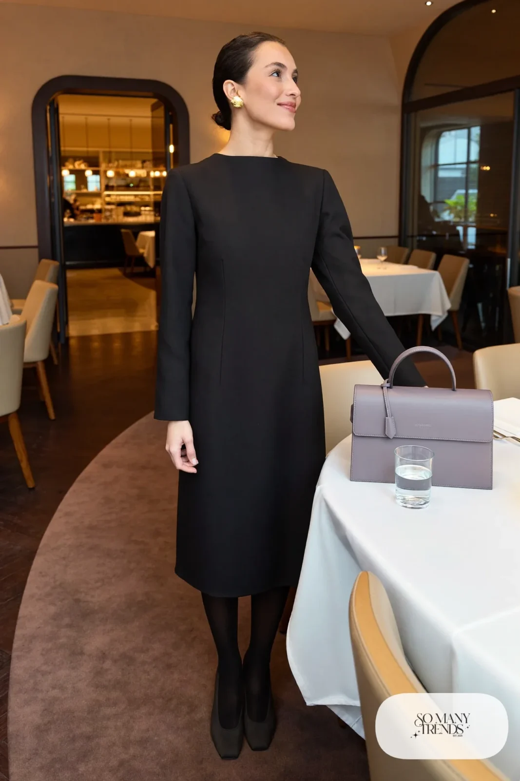 black long-sleeve midi dress with lilac structured top-handle bag and black pumps, interview outfit 32