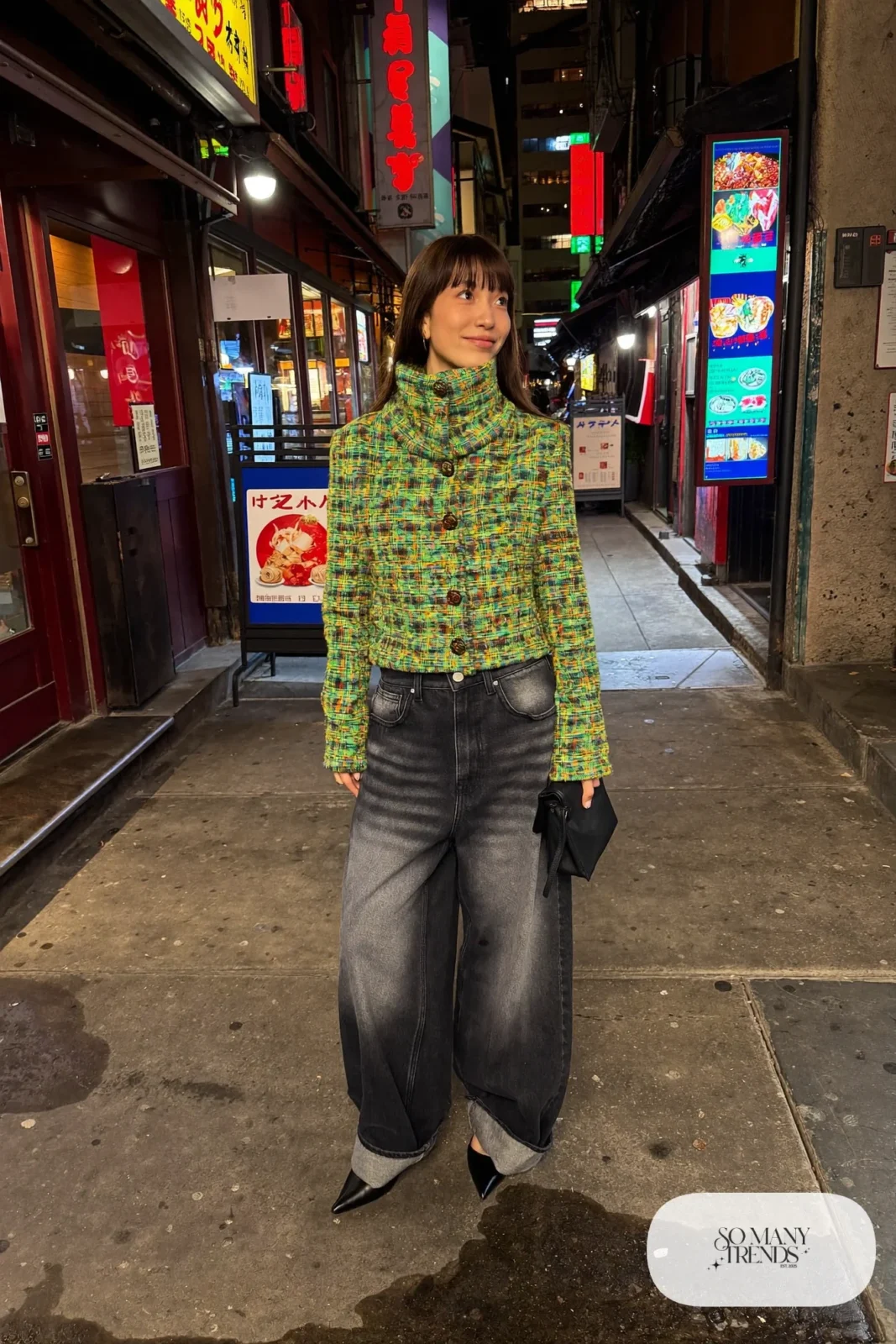 Woman in a cropped multicolored metallic tweed jacket, baggy washed black jeans and pointed black flats at night in Shibuya, outfit 13