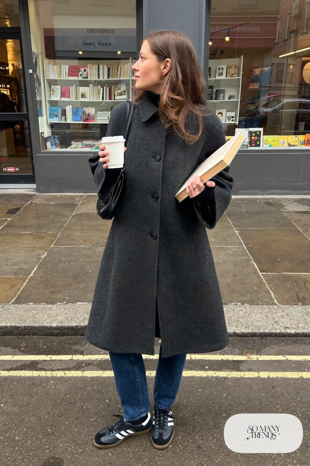 Charcoal gray wool cape coat, black fitted turtleneck, dark straight jeans and black Adidas Samba sneakers, outfit 7
