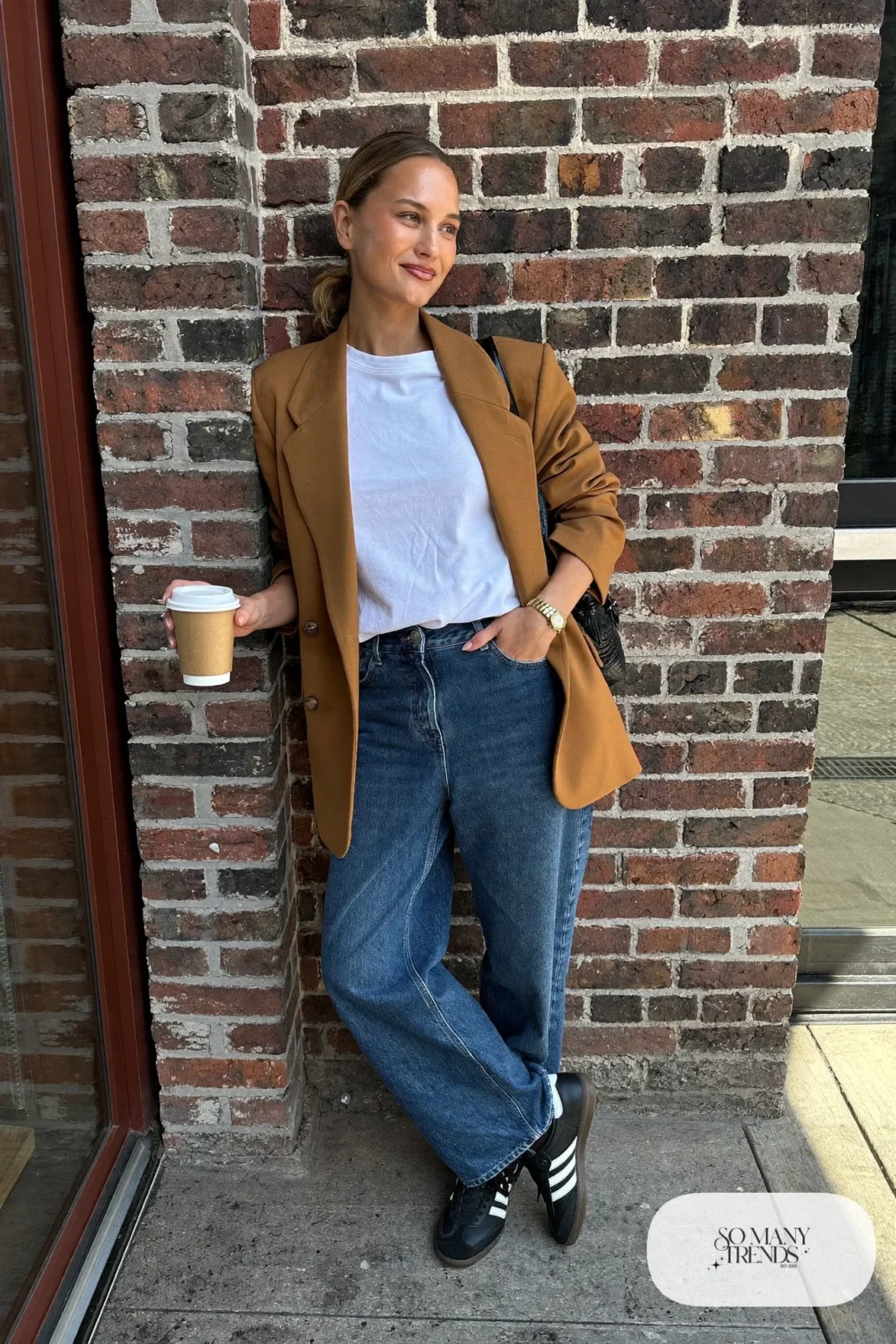 Oversized camel blazer, white crewneck tee, dark barrel-leg jeans and black Adidas Samba sneakers, outfit 13