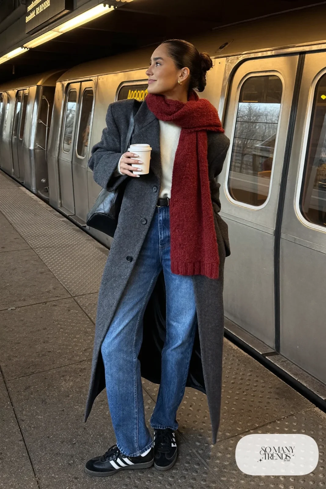Charcoal wool coat, burgundy knit scarf, cream sweater, straight indigo jeans and black Adidas Samba sneakers, outfit 16