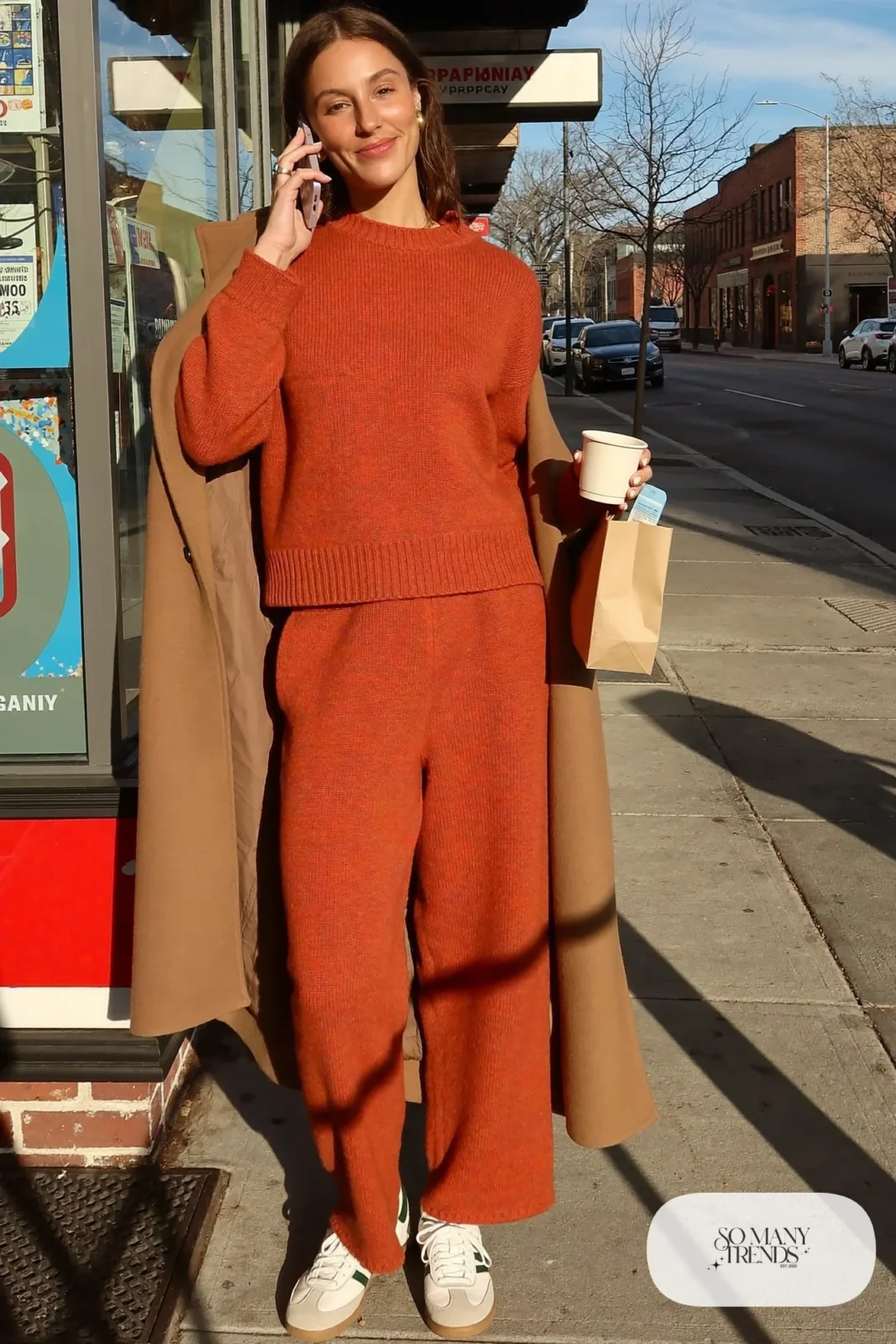 Rust knit sweater and wide-leg knit pants set, long camel coat and cream Adidas Samba sneakers with gum sole, outfit 17