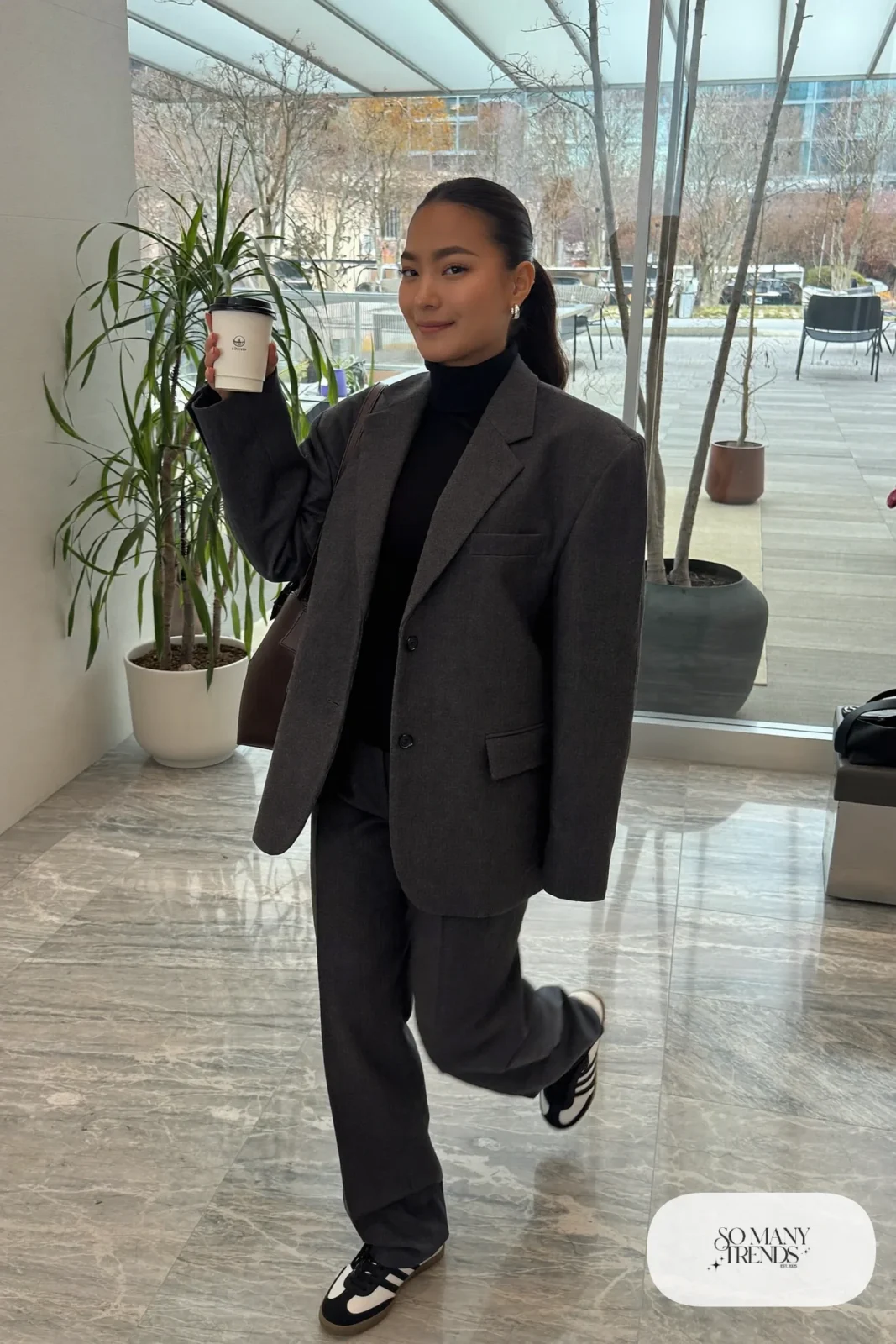 Charcoal tailored blazer and straight-leg pants, black turtleneck and black Adidas Samba sneakers, outfit 22
