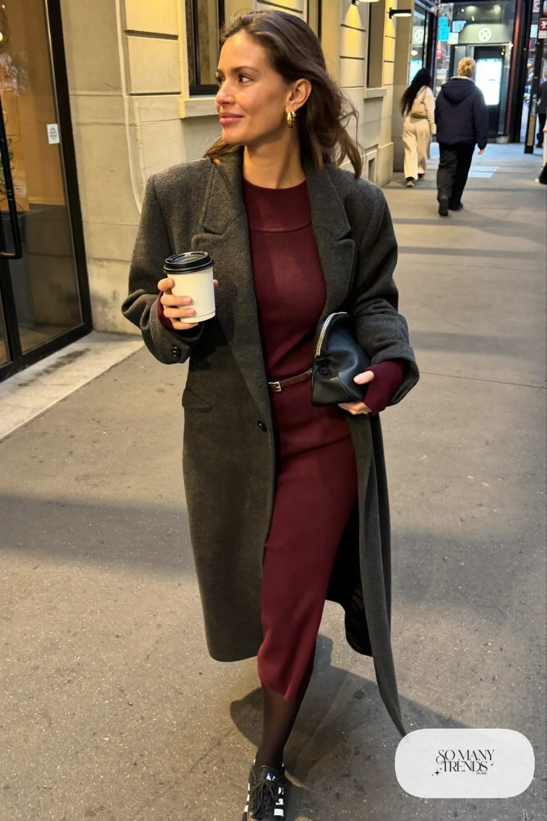 Burgundy knit midi dress, long charcoal coat, sheer black tights and black Adidas Samba sneakers, outfit 28