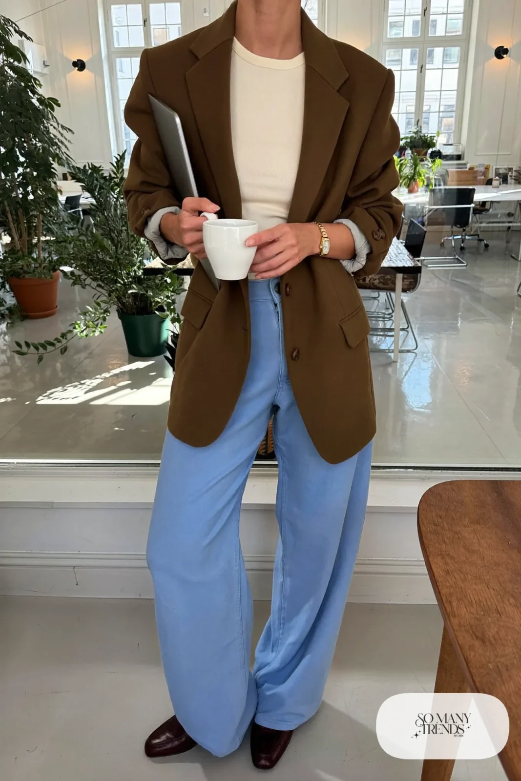 Oversized espresso brown blazer over an ivory tee with powder blue wide-leg pants and brown leather loafers, outfit 5