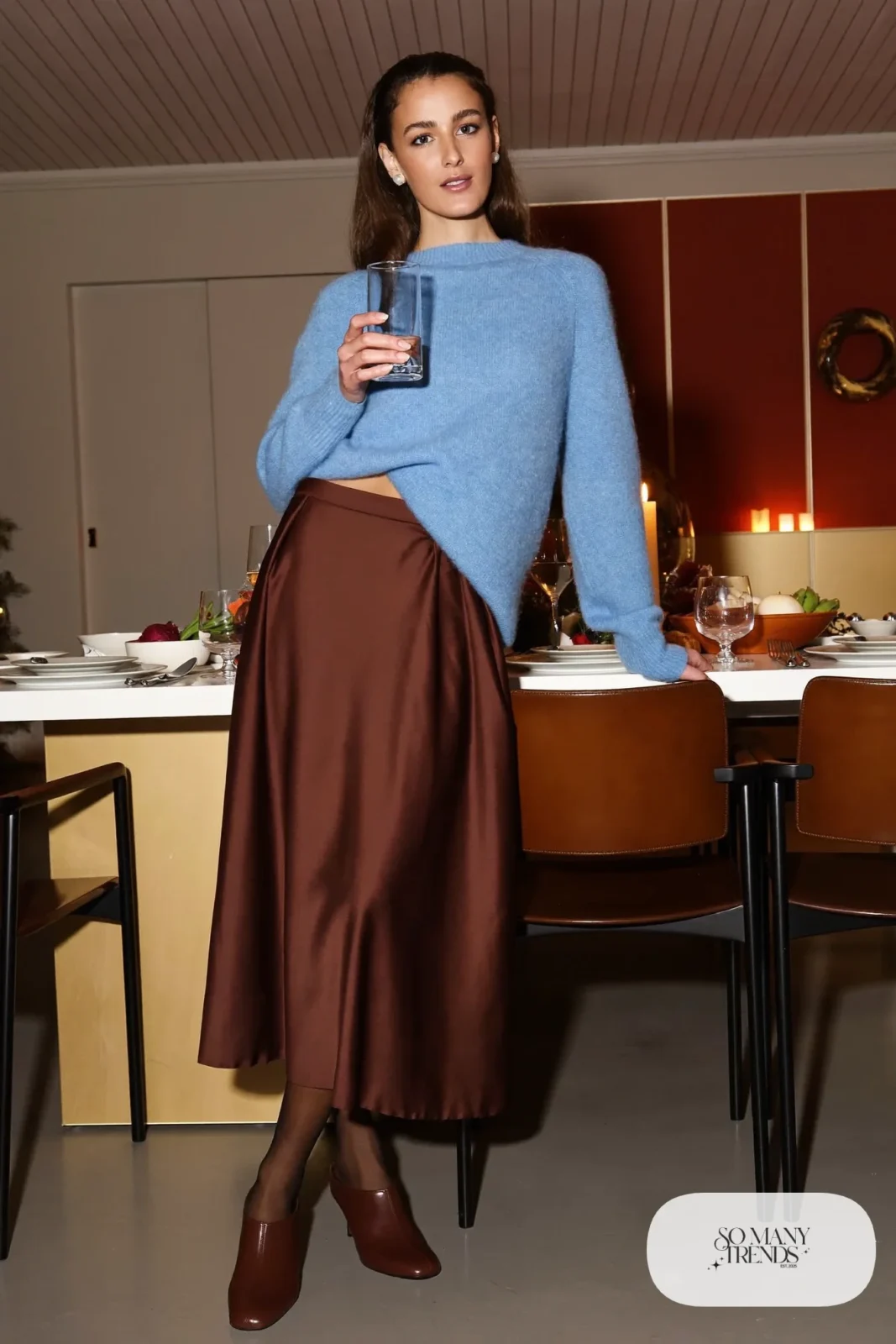 Baby blue cashmere sweater with a chocolate satin bias-cut midi skirt and brown leather kitten-heel boots, outfit 15