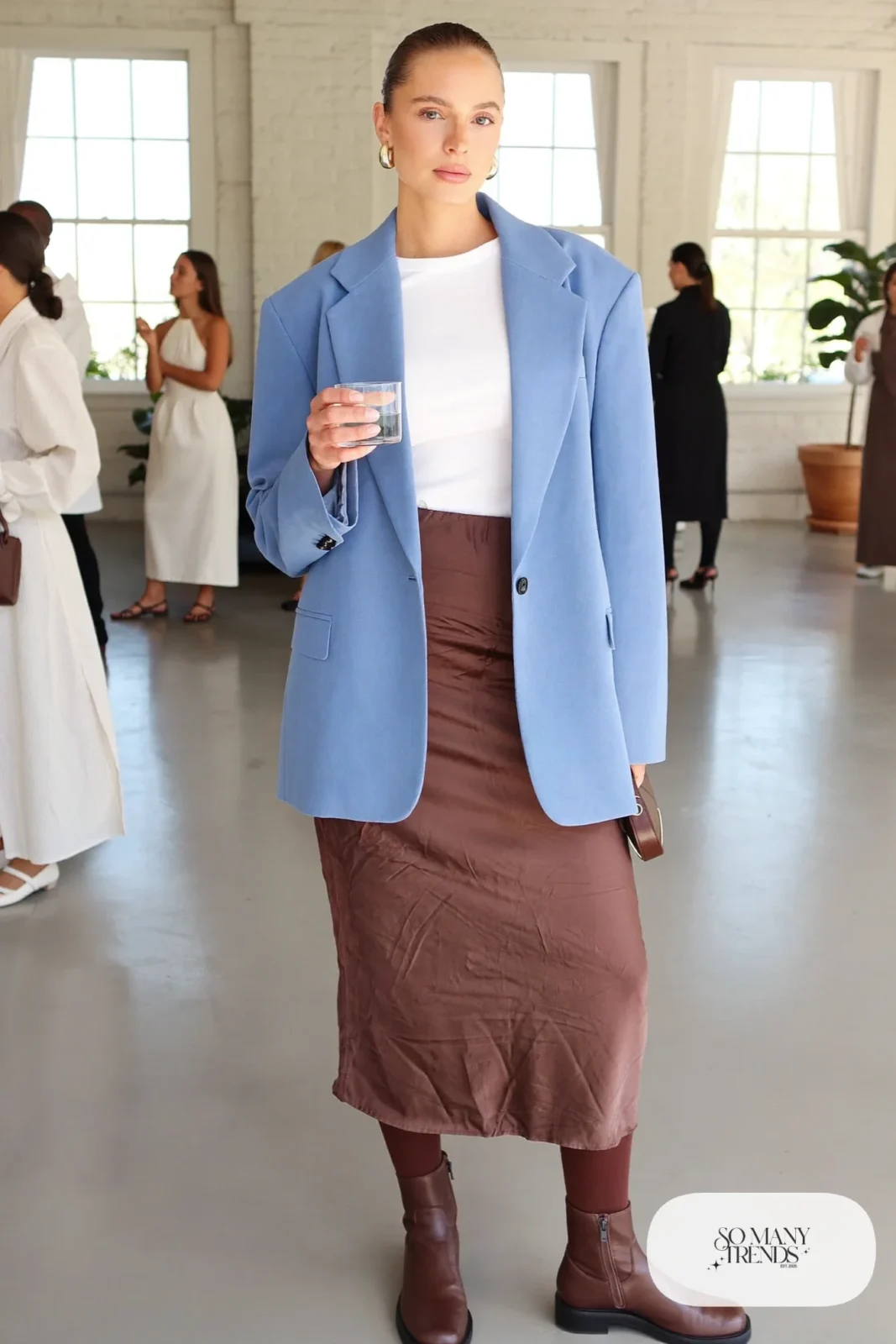 Baby blue oversized blazer over a white tee with a chocolate satin slip midi skirt and brown boots, outfit 29