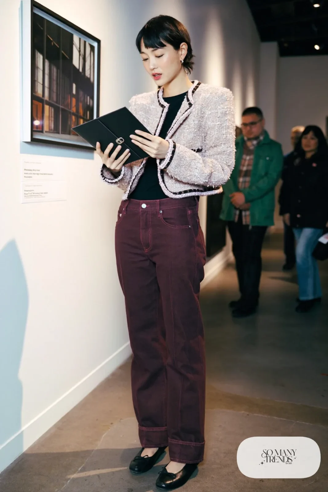 Woman in cropped pink tweed jacket, black tee, wine straight jeans and black ballet flats, outfit 9