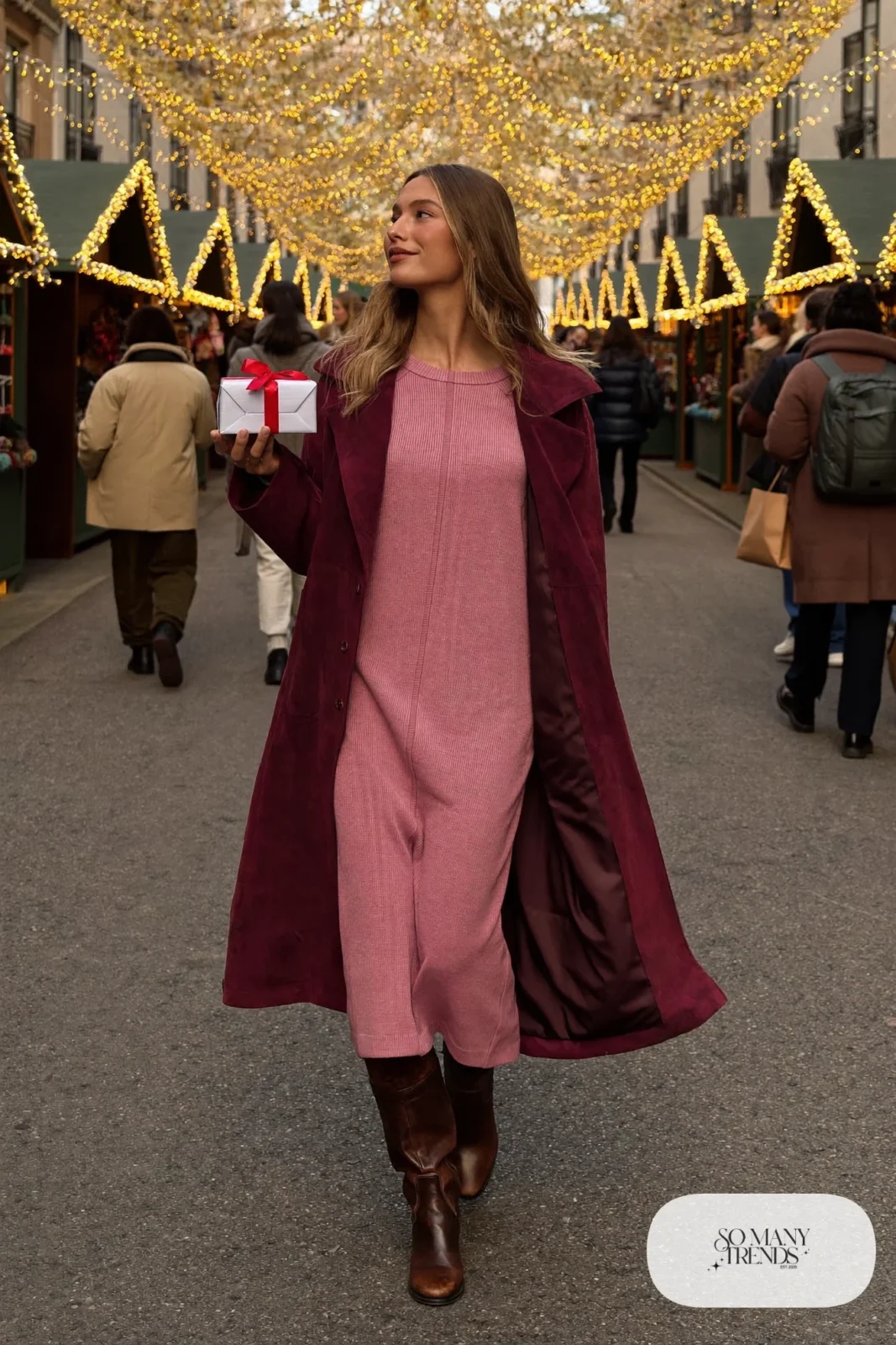 Woman in burgundy faux suede coat, pink rib-knit midi dress and brown tall leather boots, outfit 27