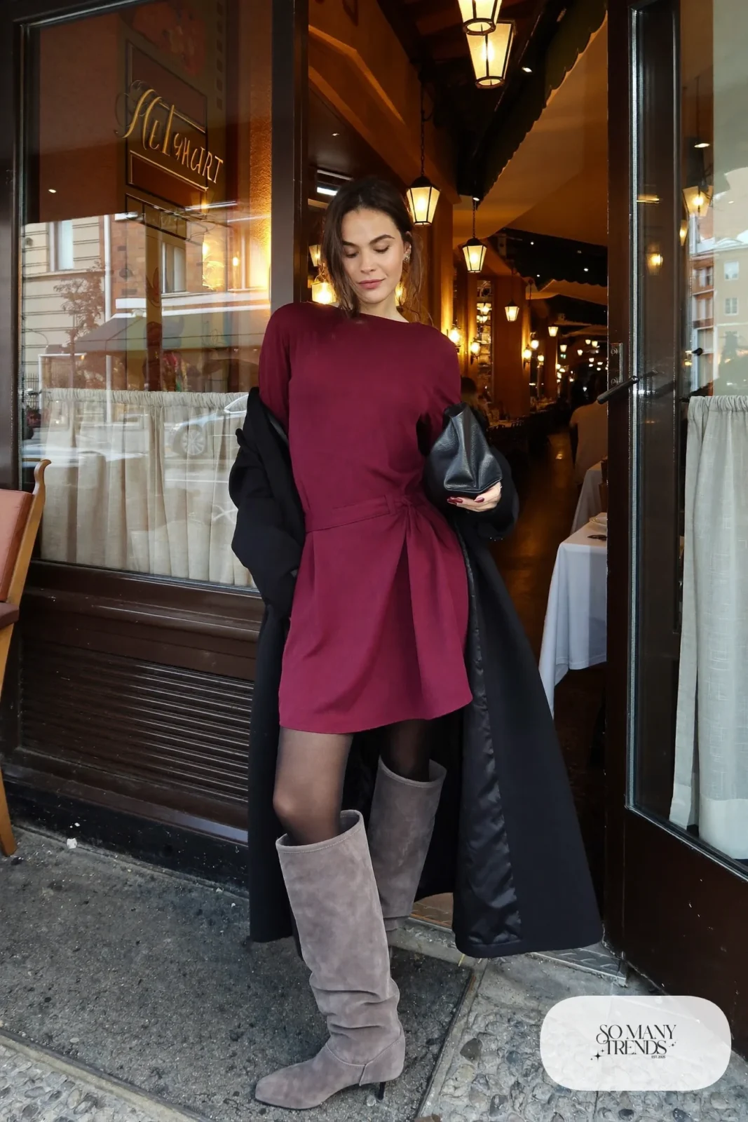 Woman in oxblood long-sleeve midi dress, black coat and slouchy gray suede boots, outfit 11