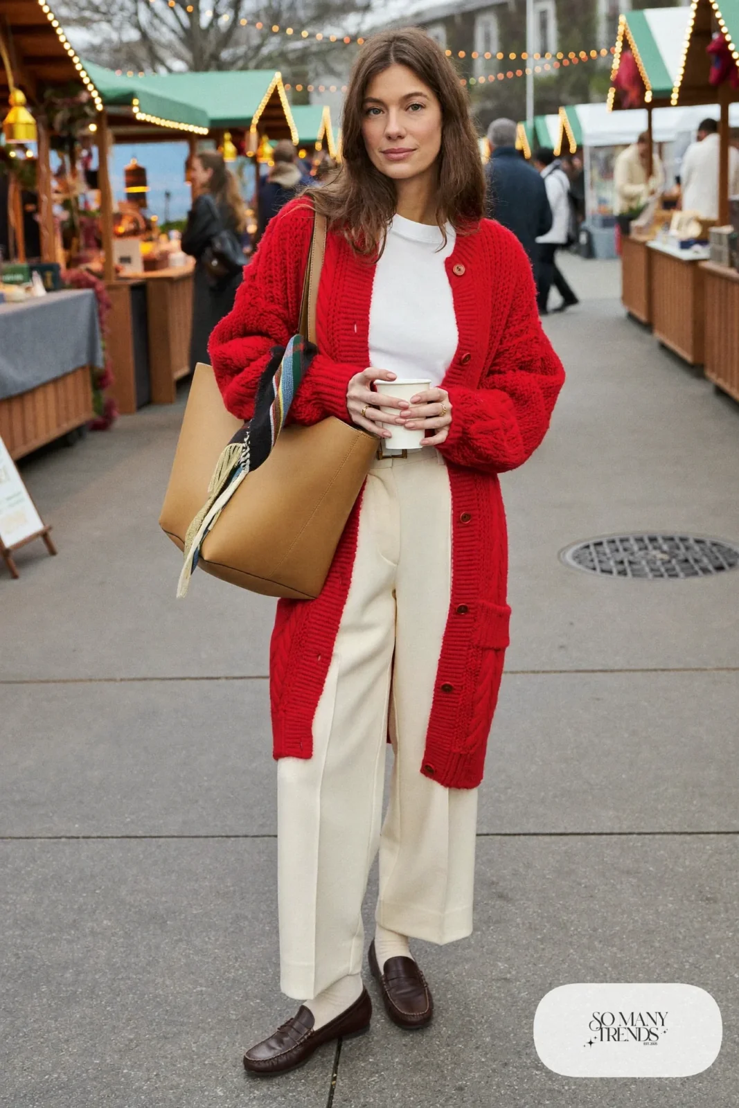 Look 18: cherry red chunky cardigan, white tee, cream wide-leg trousers, brown loafers, tan tote bag