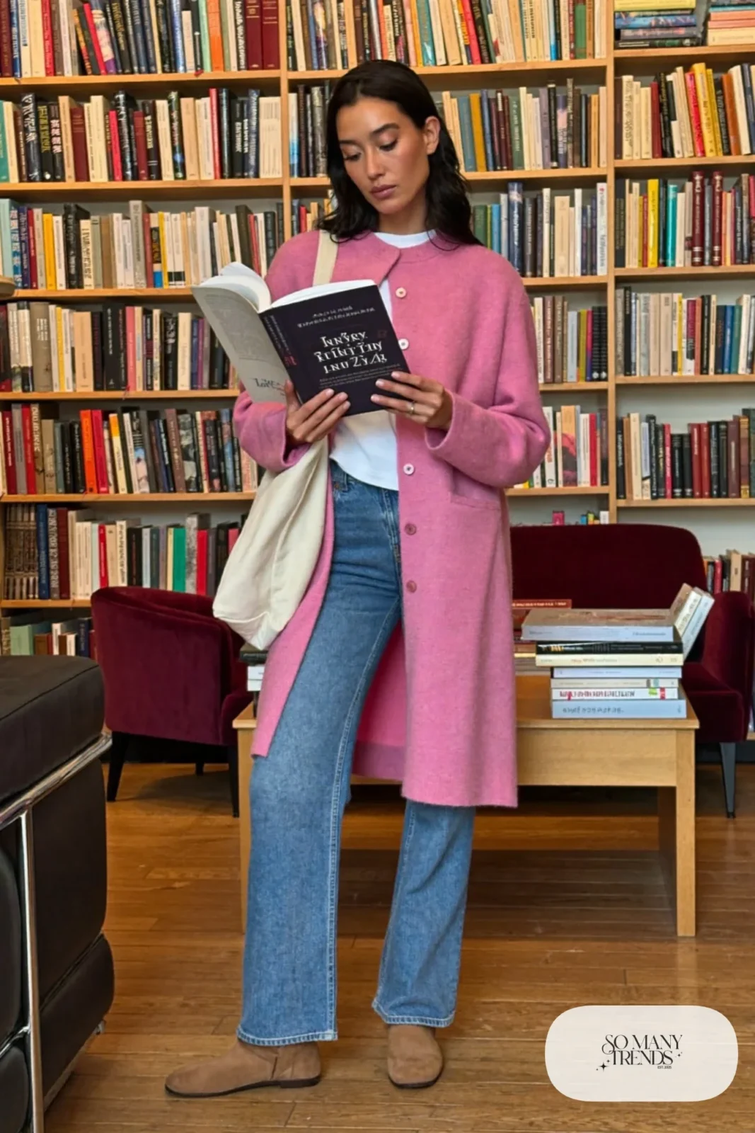 Woman in barrel jeans, long dusty pink cardigan, white tee and tan suede ankle boots, look 5