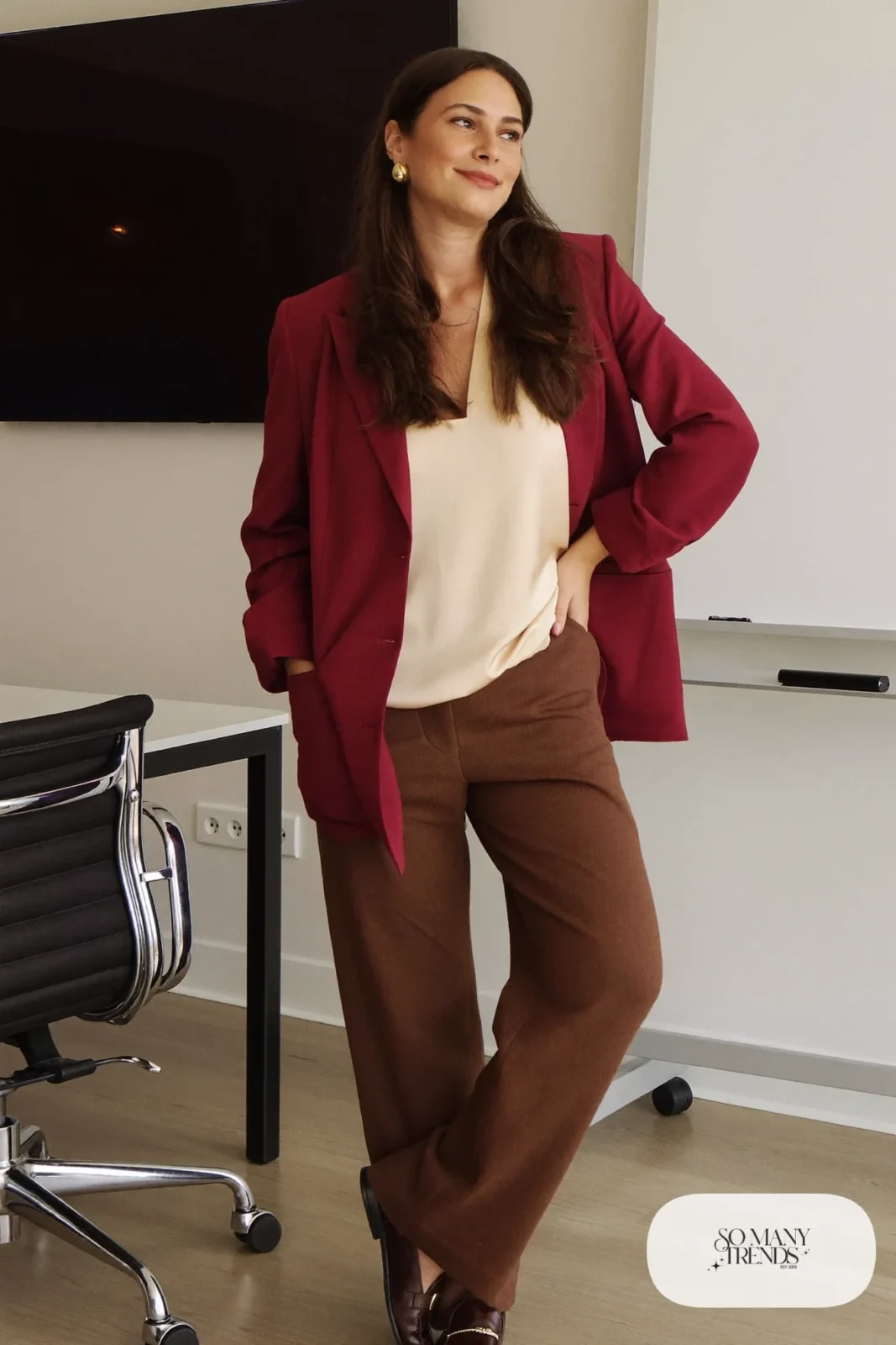 Woman in a burgundy blazer, chocolate wide-leg pants, cream top and brown loafers, outfit 25
