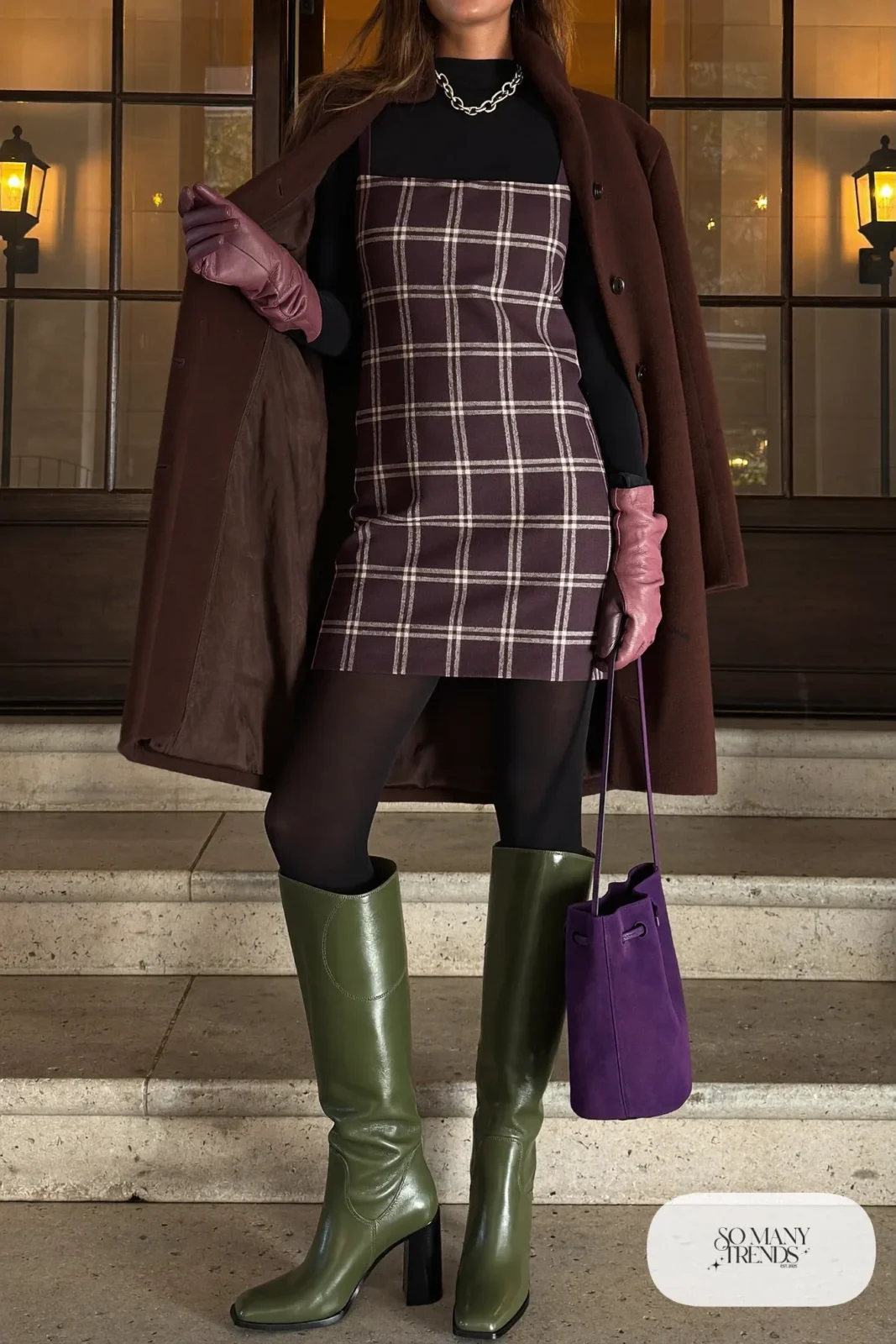 Woman in a plum and gray tweed shift dress, chocolate funnel neck coat, dusty pink leather gloves and green boots, outfit 24