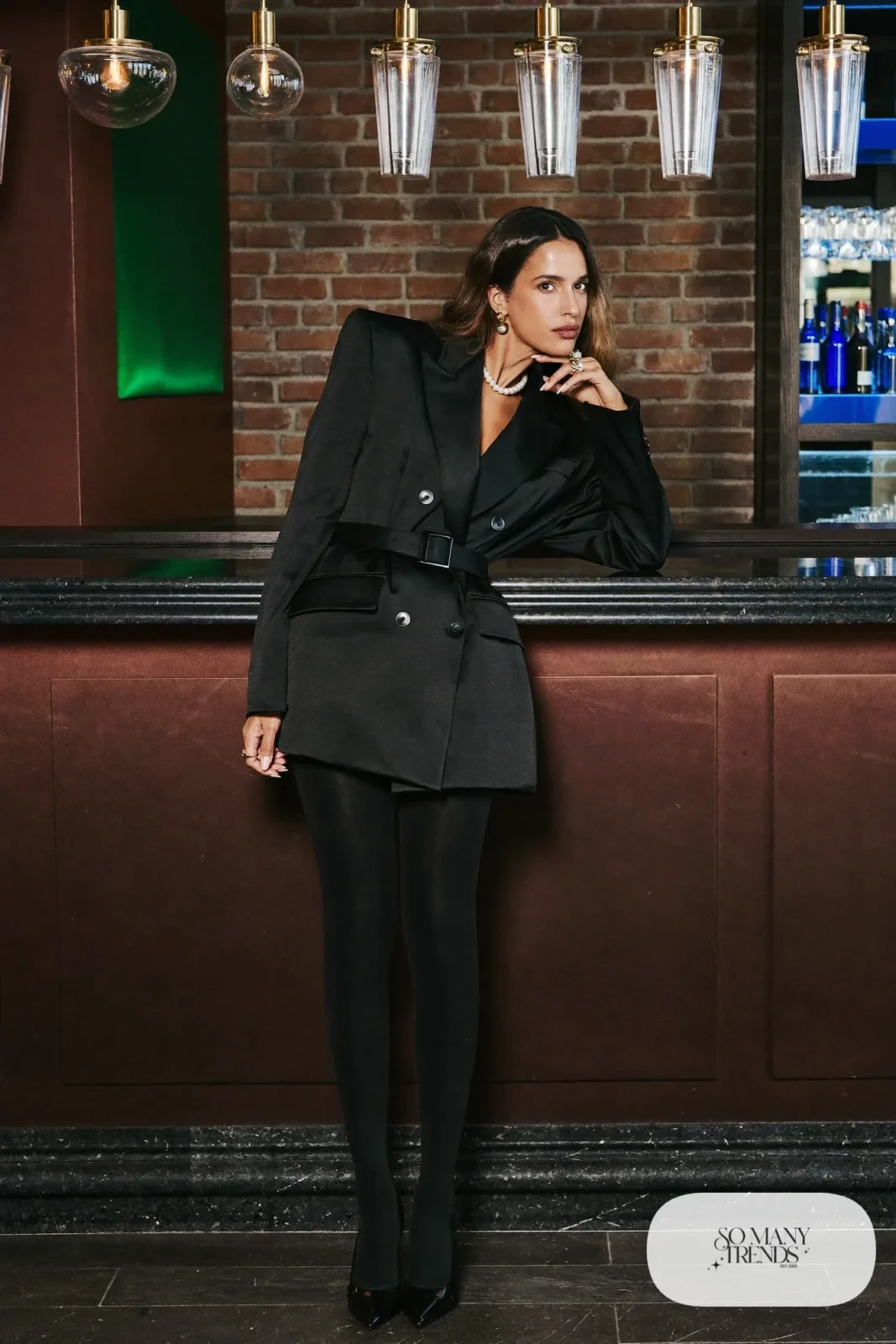 Oversized black double-breasted blazer dress with belt, sheer black tights and pointed pumps, outfit 9