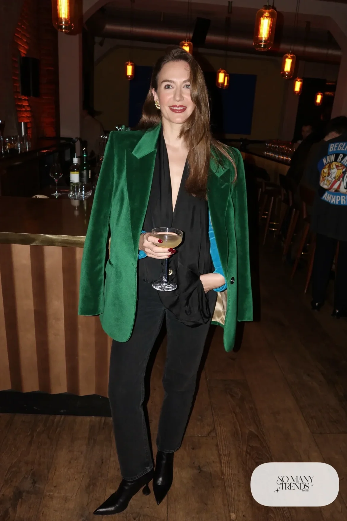 Emerald oversized blazer with black silk top, straight black jeans and pointed heeled boots, outfit 20