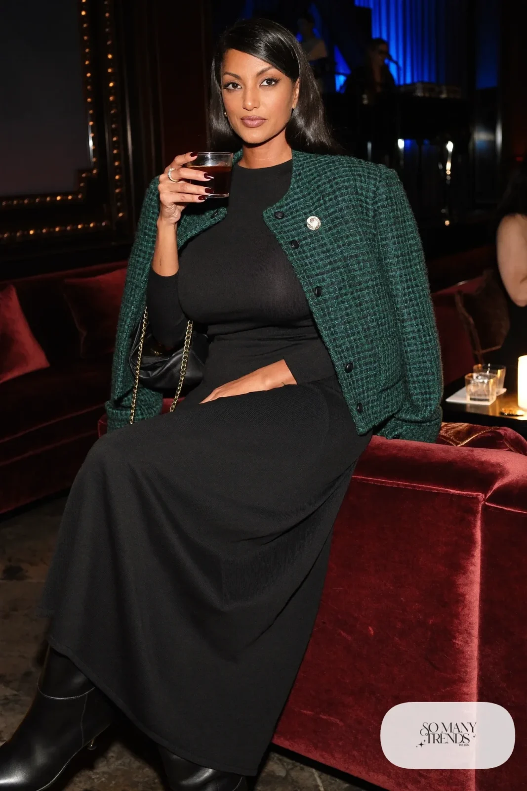 Black knit skirt and top set with cropped dark green tweed jacket and knee boots, outfit 24