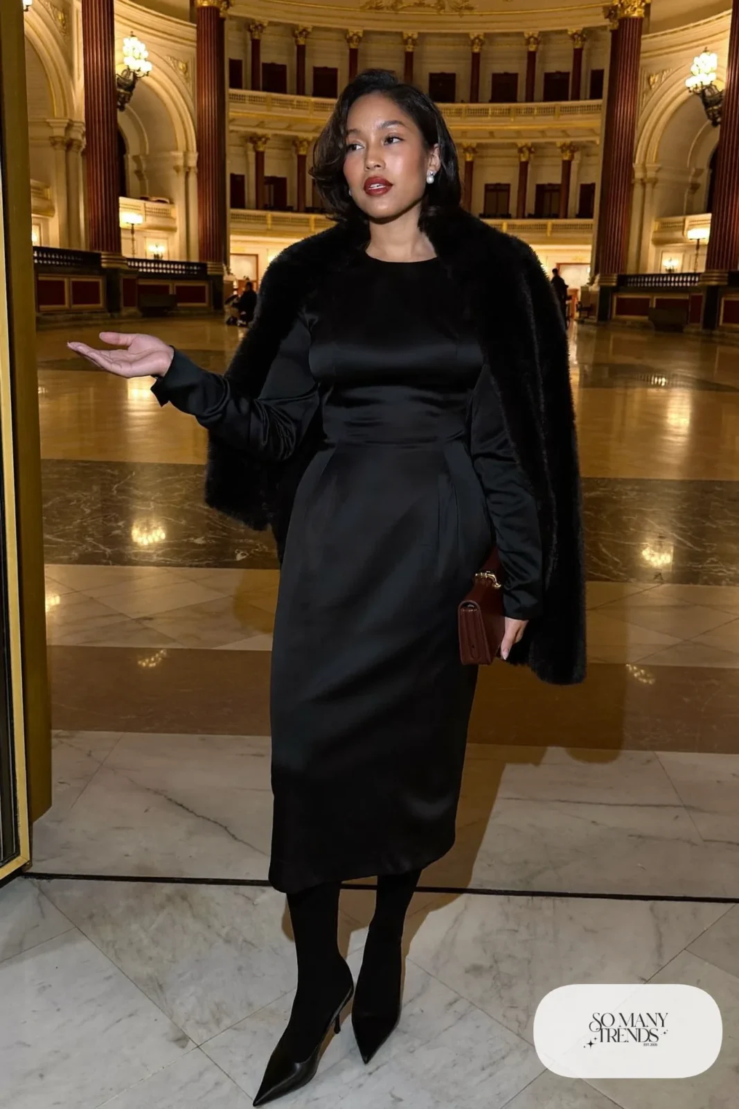Black midi dress with faux fur stole, pointed pumps and small earrings, outfit 27