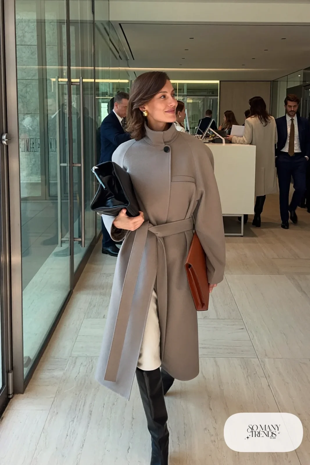 taupe collarless long coat-dress with black knee-high boots and structured tote, interview outfit 1