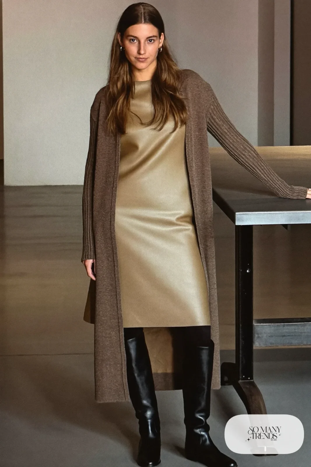 champagne satin slip midi dress with long taupe knit cardigan coat and black boots, interview outfit 18