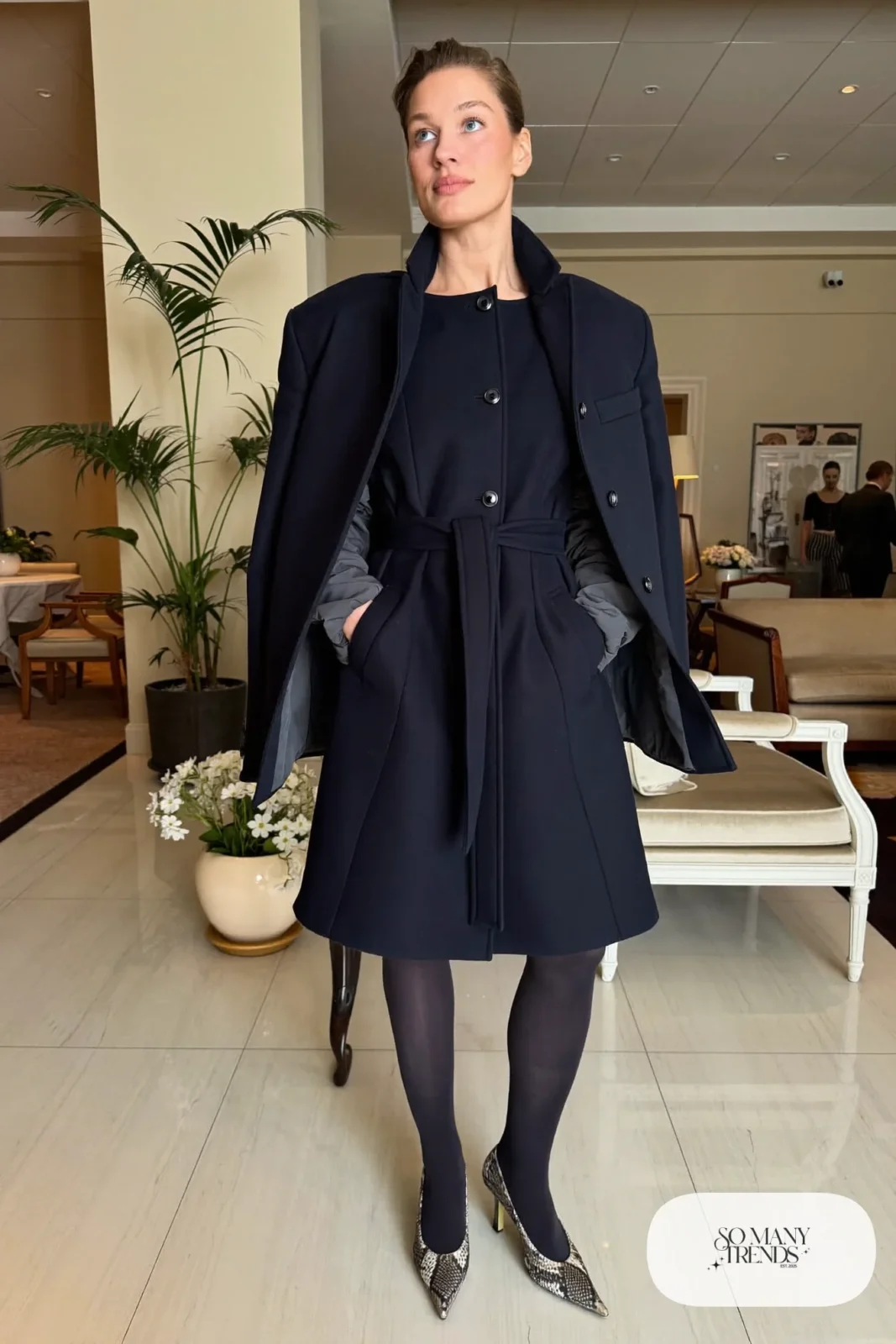navy belted coat-dress with snake print pumps and black dome bag, interview outfit 31