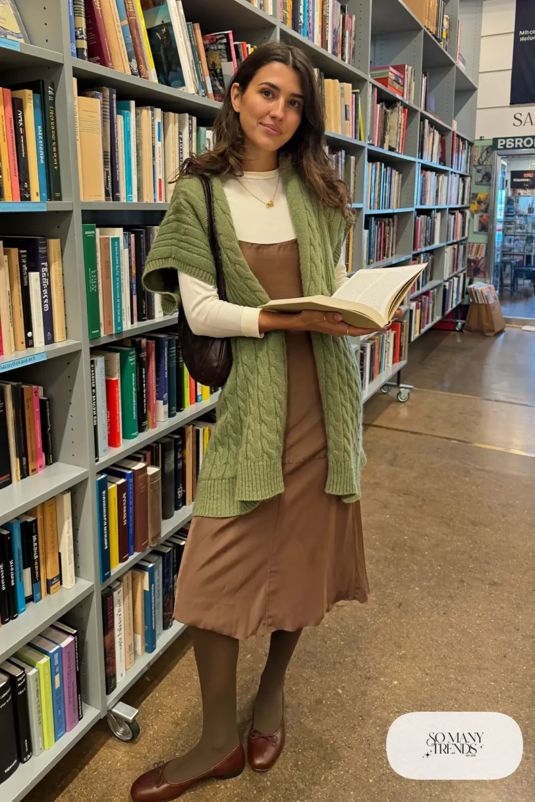 Woman in sage knit vest, cream tee, mocha satin slip dress, sheer tights and brown ballet flats, outfit 17