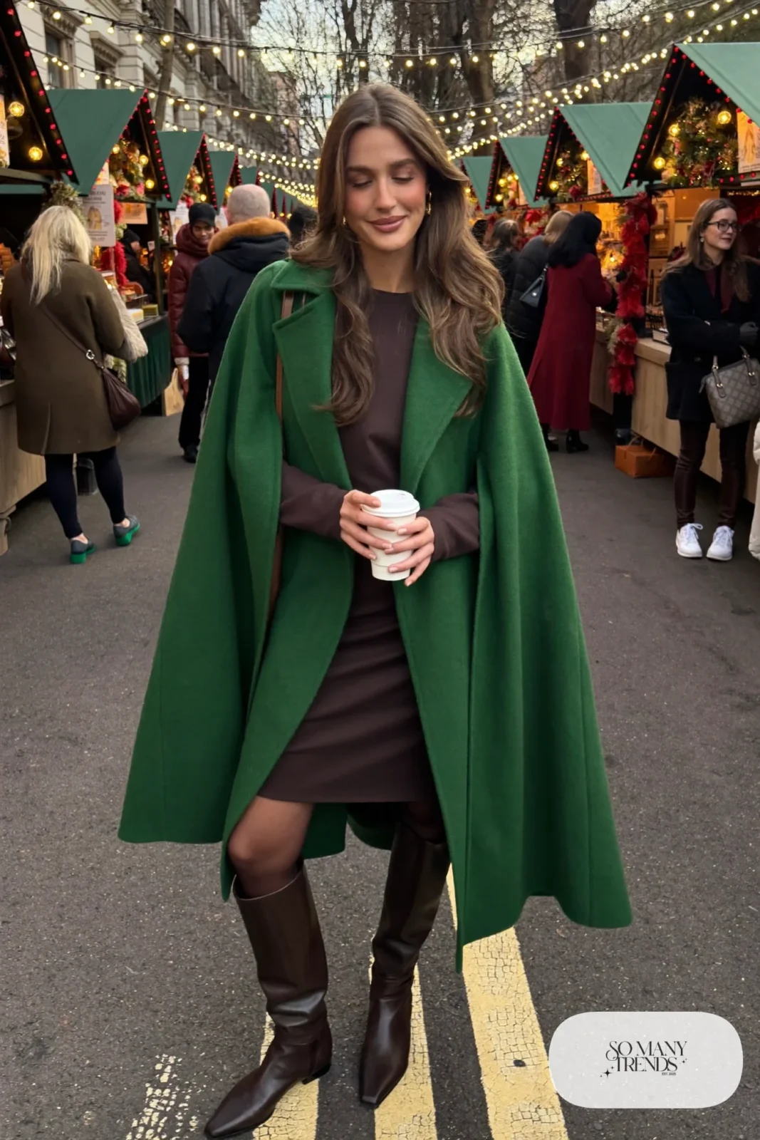 Woman in forest green wool cape, chocolate brown midi dress and tall boots, outfit 24