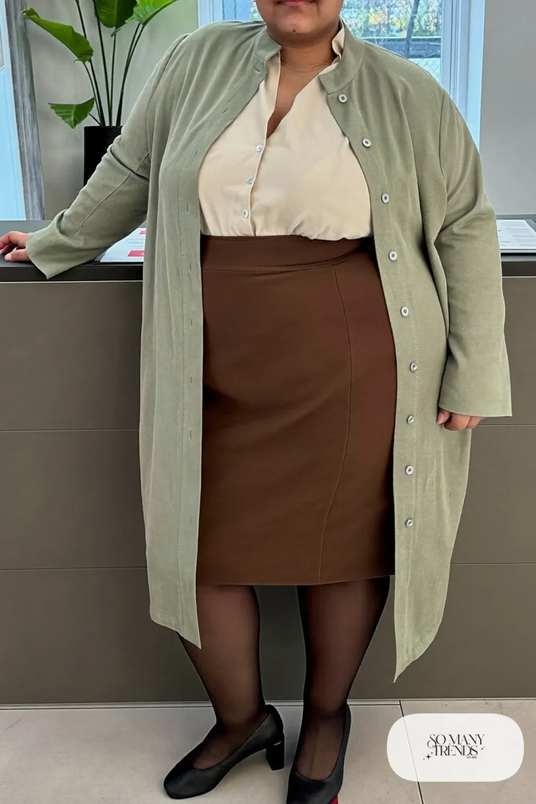 Woman in oatmeal crepe V-neck blouse, espresso ponte pencil skirt, long sage cardigan and low block-heel pumps, outfit 16