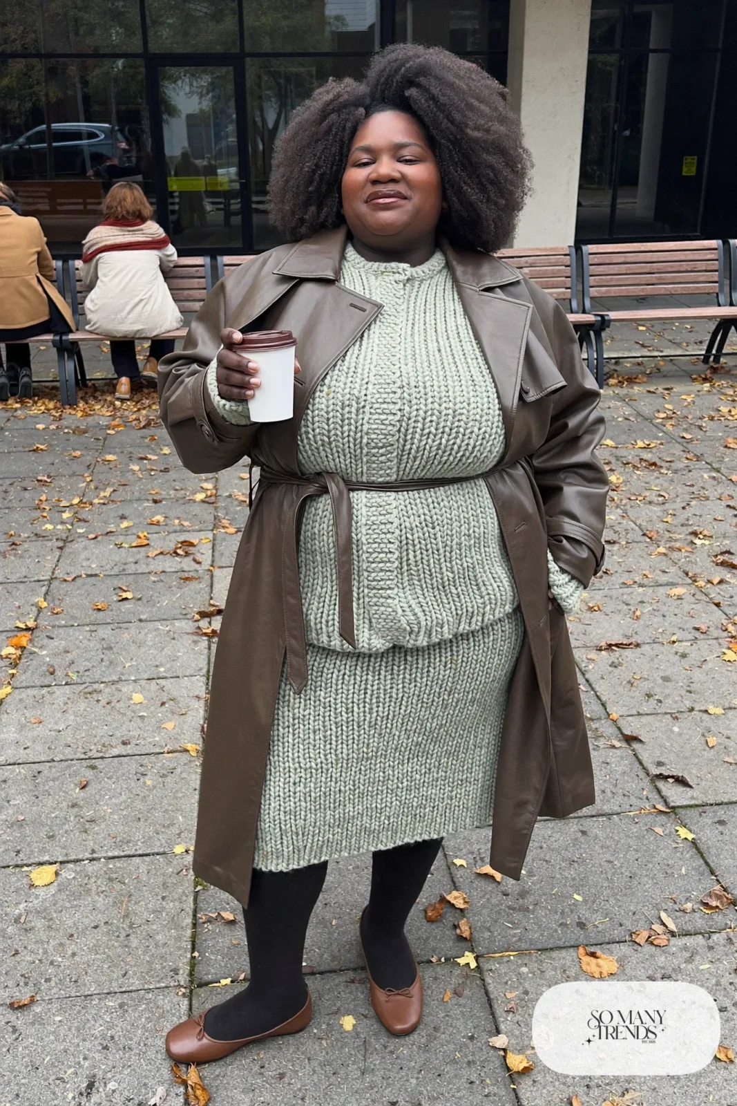 Woman in sage knit cardigan and midi skirt set, espresso trench coat and brown ankle-strap flats, outfit 18