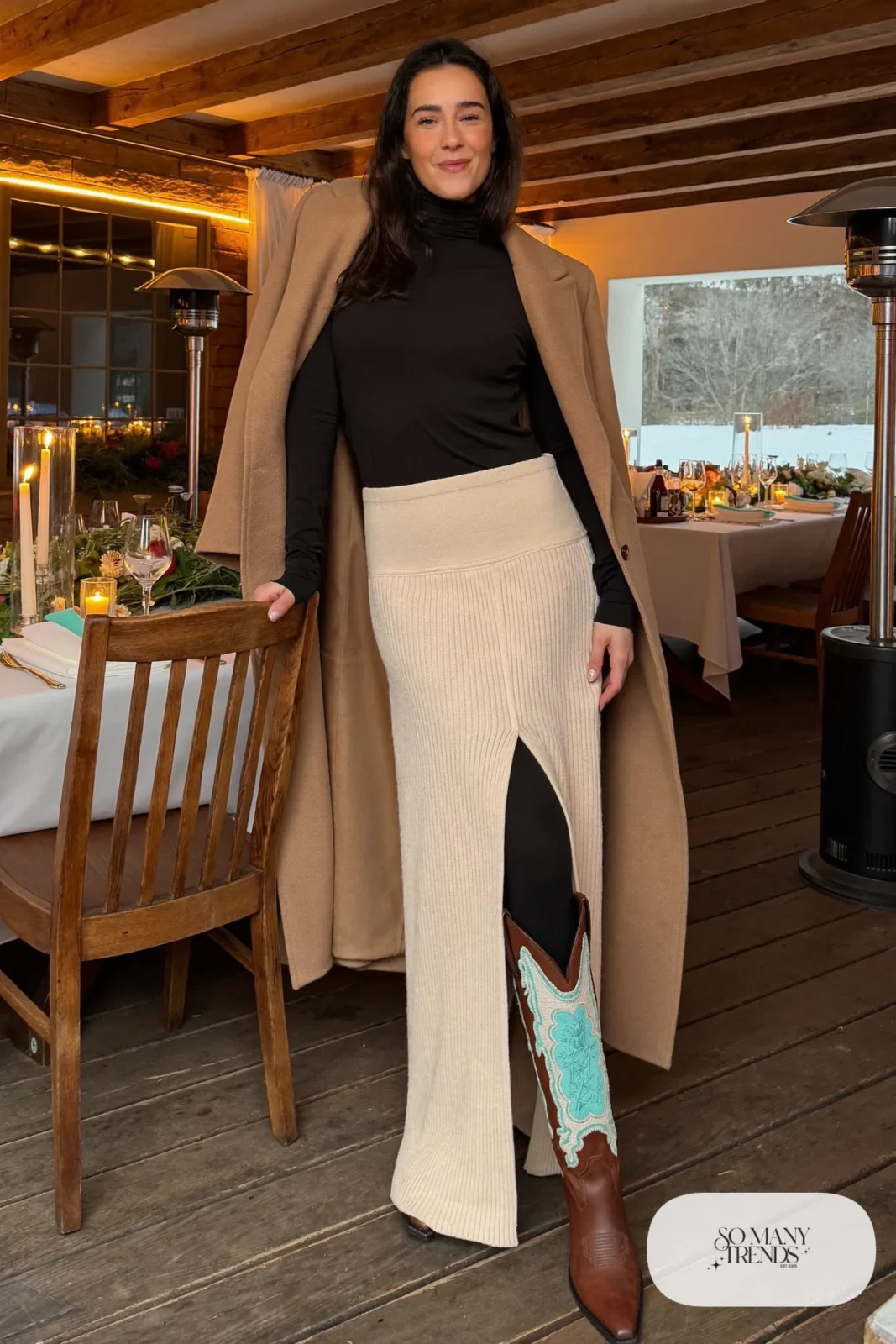 Black fitted turtleneck, cream column maxi skirt with slit, embroidered cowboy boots and long coat, outfit 31
