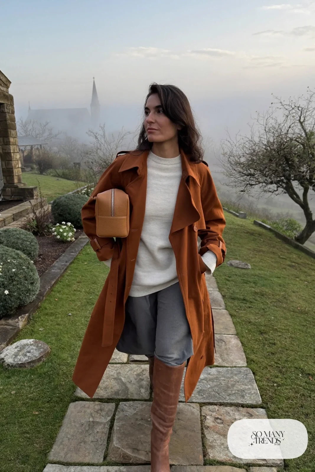 Rust-brown belted trench, gray midi skirt, cream knit and brown knee boots - outfit 25