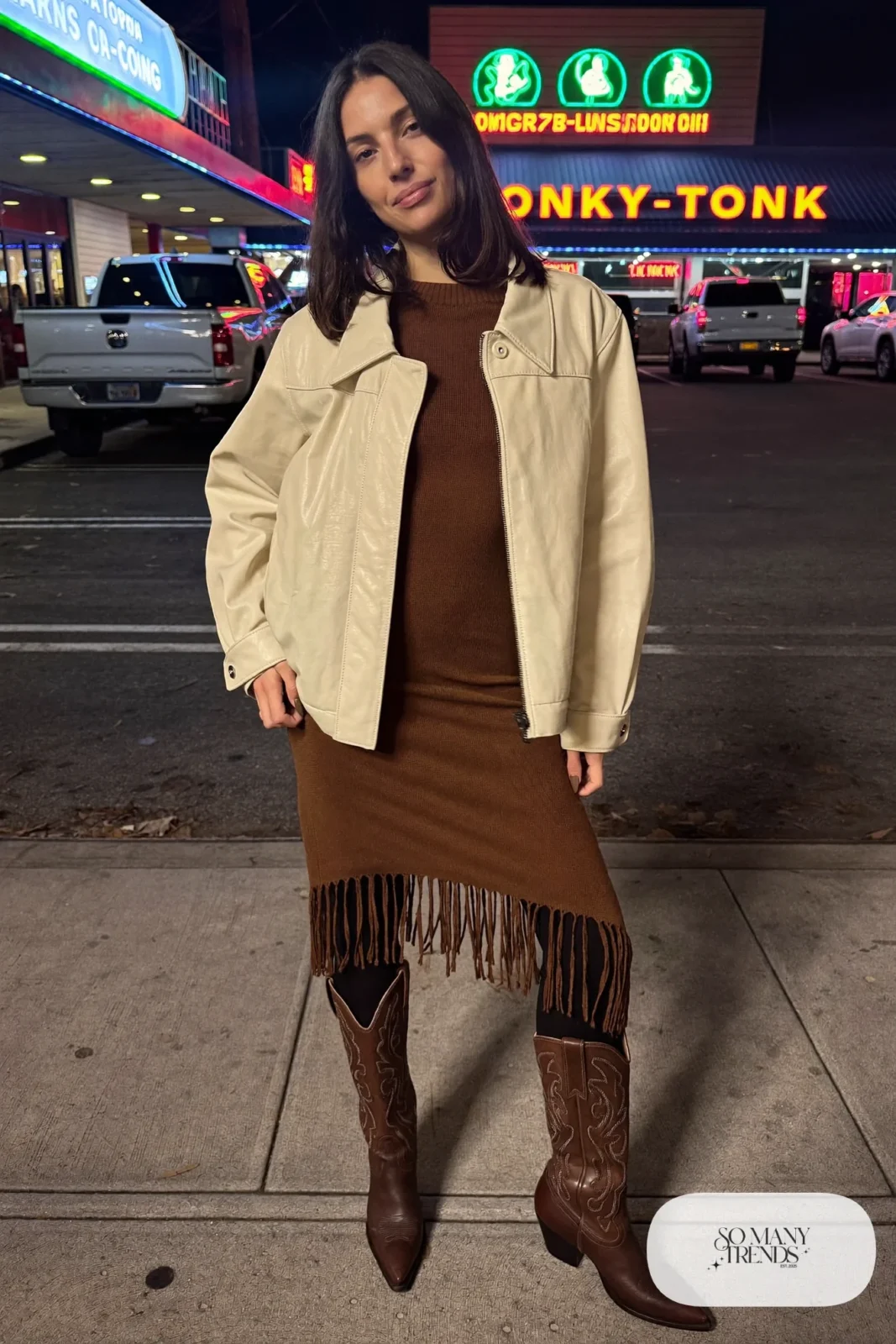 Chocolate fringe-hem midi dress with cropped cream leather jacket, black tights and tall brown boots, outfit 18
