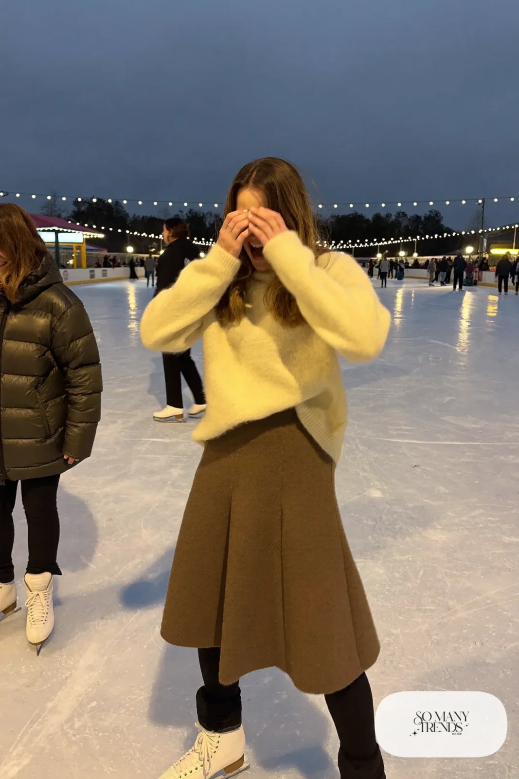 Butter yellow lambswool sweater, mocha wool skirt, black fleece tights, cream beanie and ice skates - outfit 23
