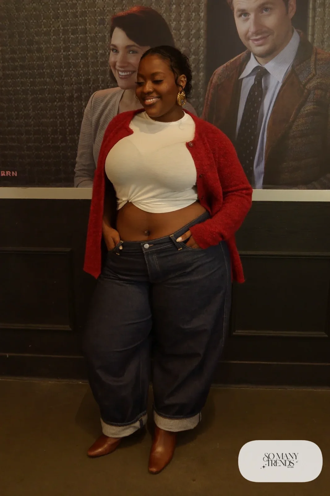 Plus size woman in dark wide jeans, ivory tee, oxblood long cardigan and brown ankle boots, outfit 15