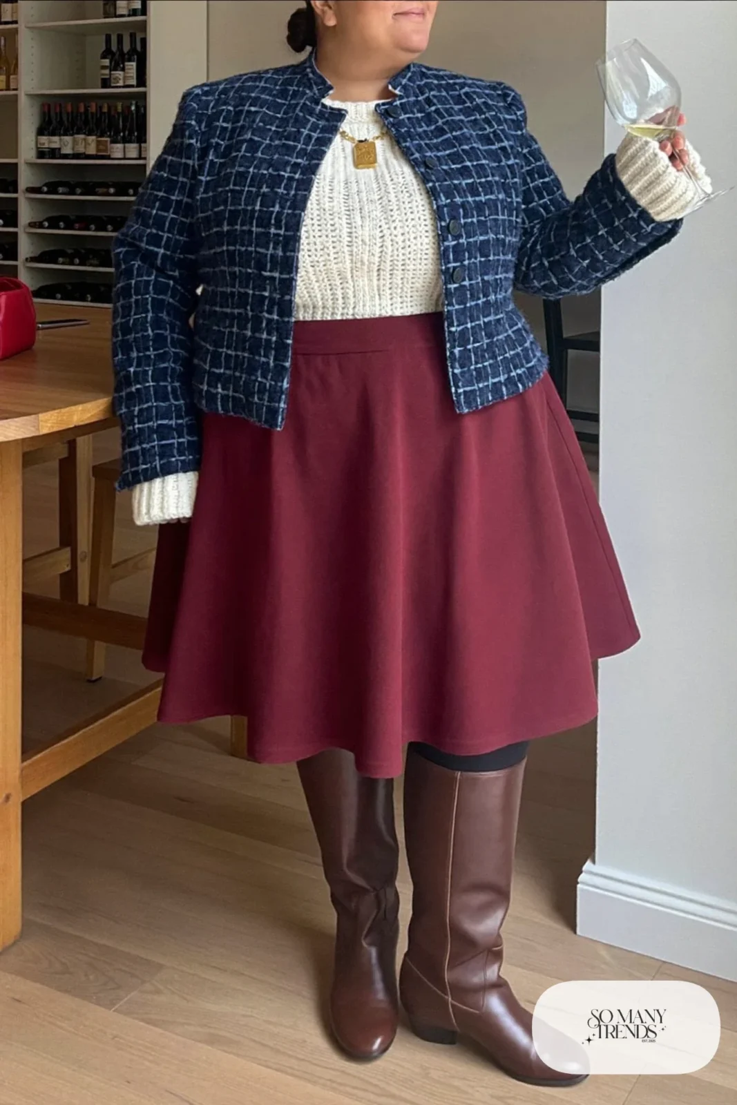 Plus size woman in navy tweed cropped jacket, ivory top, oxblood midi skirt and tall brown boots, outfit 19