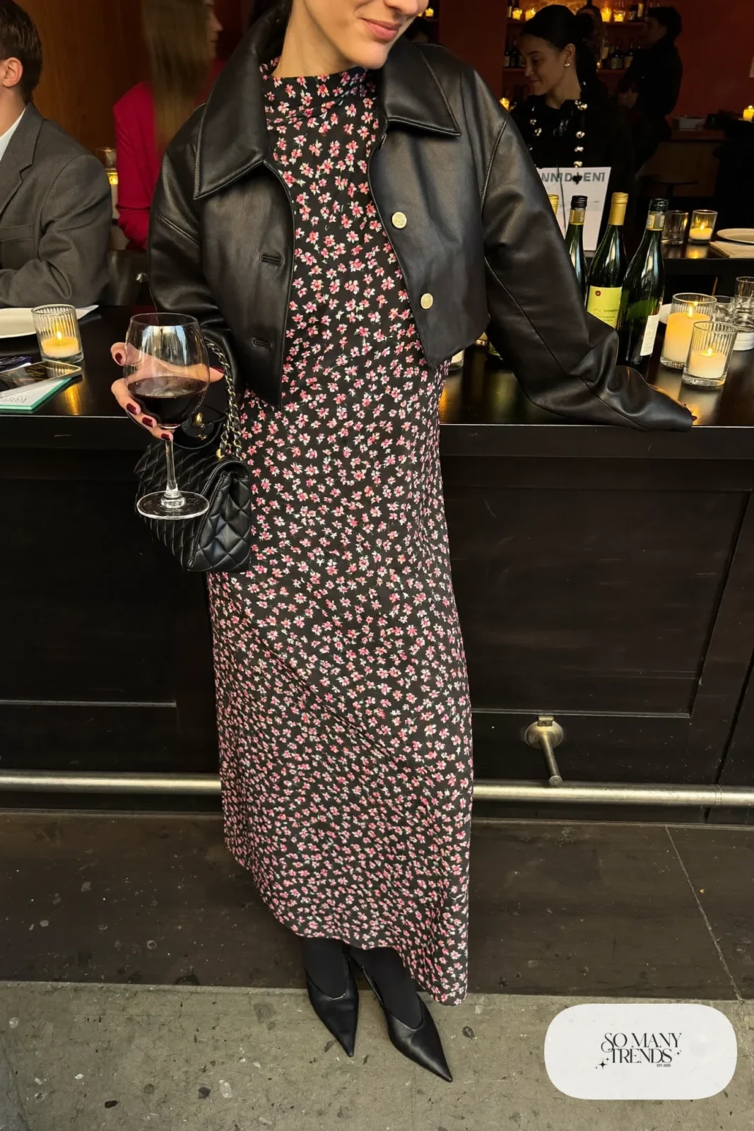 Black chiffon floral maxi dress with long sleeves, cropped black leather jacket, black flats and quilted bag, winter date outfit 7