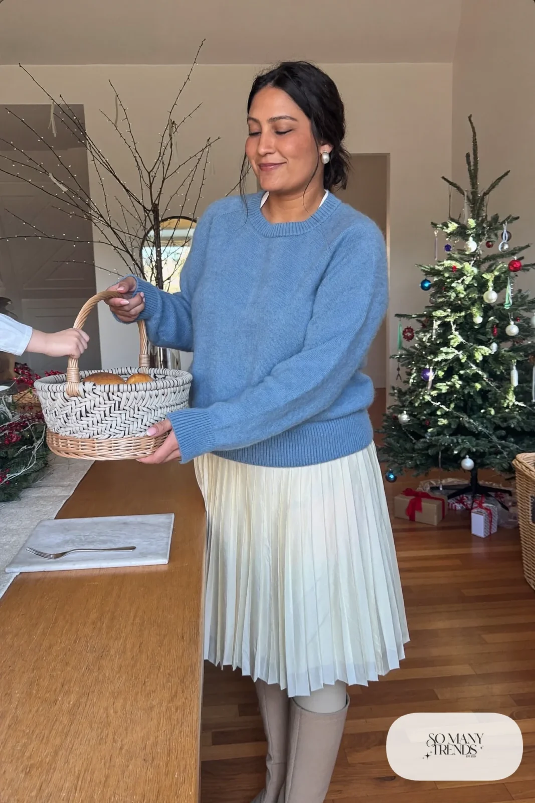 Look 15: sky blue knit sweater, cream pleated midi skirt, mocha tall boots, opaque tights